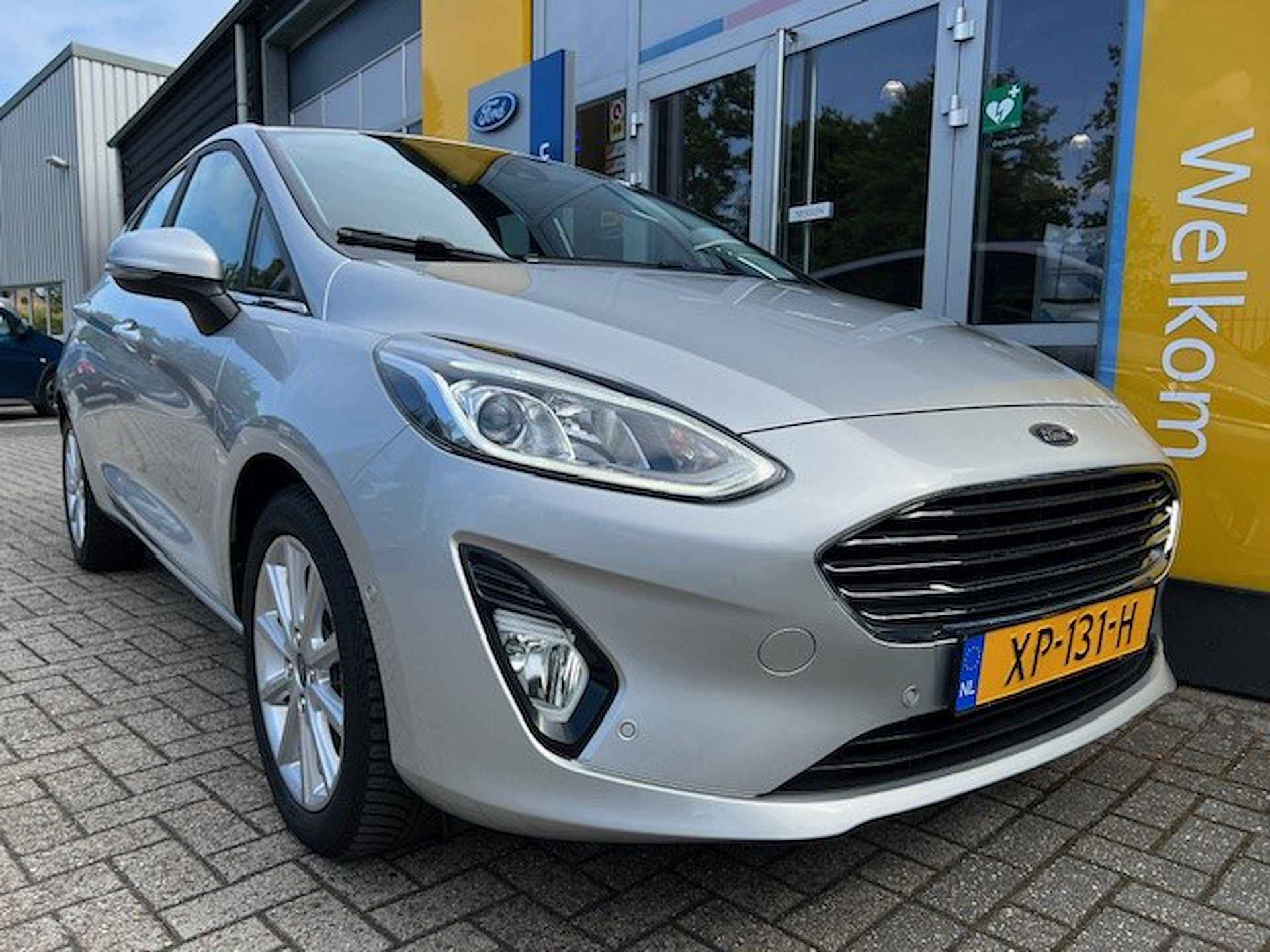 Ford Fiesta 1.0 100 PK Titanium | NAVIGATIE| CLIMATE CONTROL| CRUISE CONTROL| DAB+| PARKEERSENSOREN| 4 SEIZOENEN - 9/31