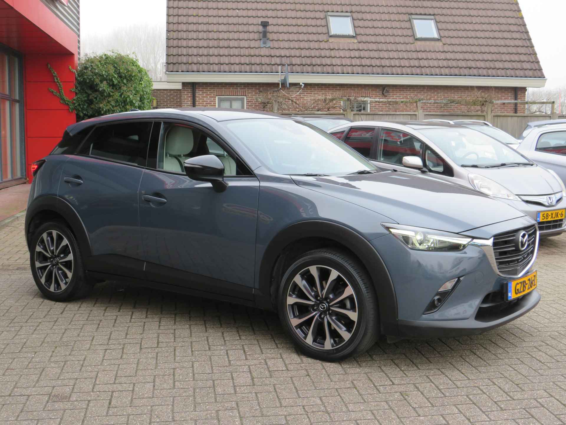 Mazda CX-3 2.0 SkyActiv-G 121 Luxury| Automaat| | Clima-Airco | Android Auto | Parkeercamera | Incl. BOVAG Garantie | Stoelverwarming | DAB+ | - 5/37