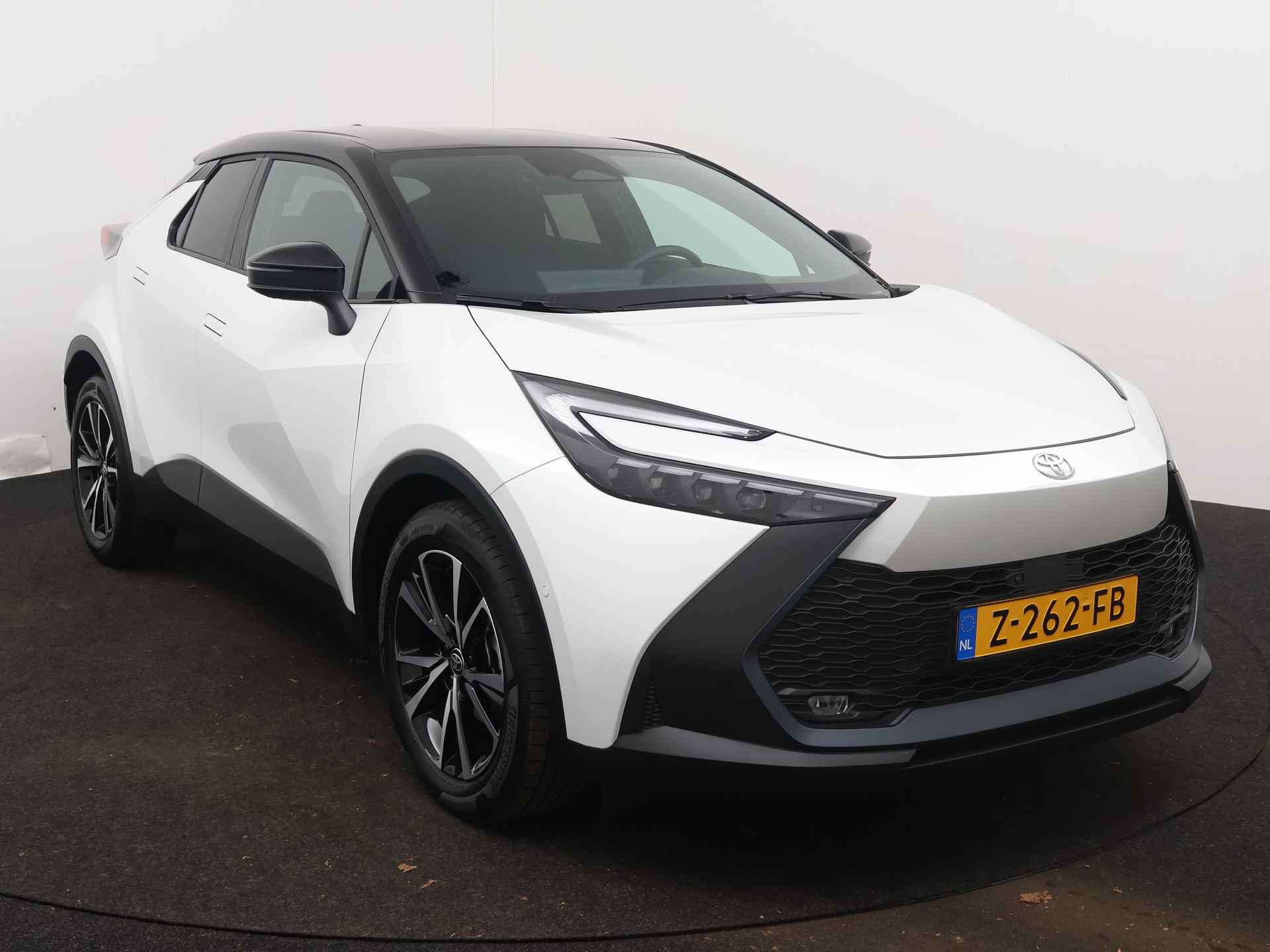 Toyota C-HR 1.8 Hybrid 140 First Edition | 360° Camera | Parkeersensoren | Navigatie | Elektrisch bedienbare achterklep | - 29/45