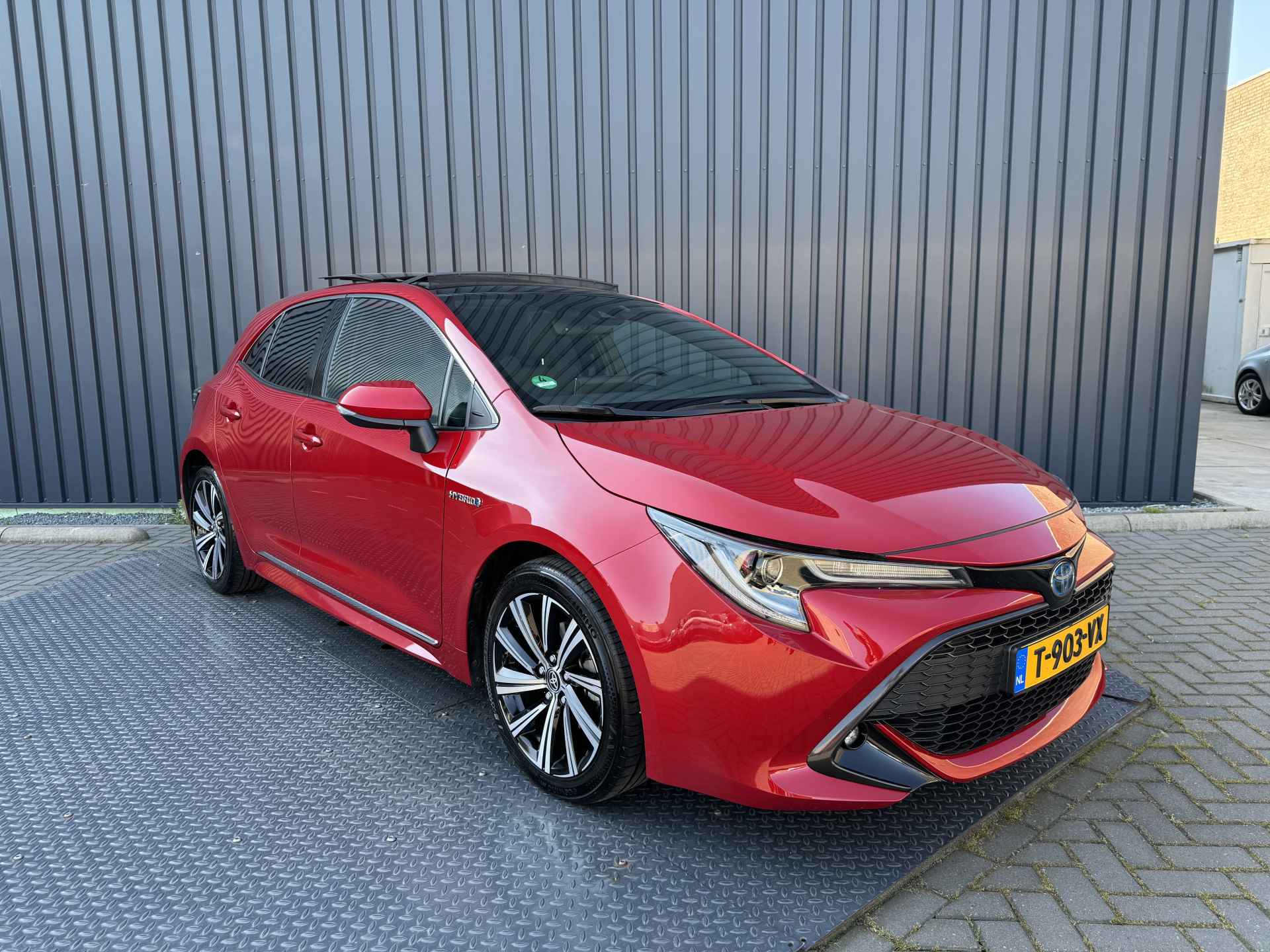 Toyota Corolla 1.8 Hybrid Dynamic | Schuif-kanteldak | NIEUWSTAAR | Rijklaar!! - 8/34