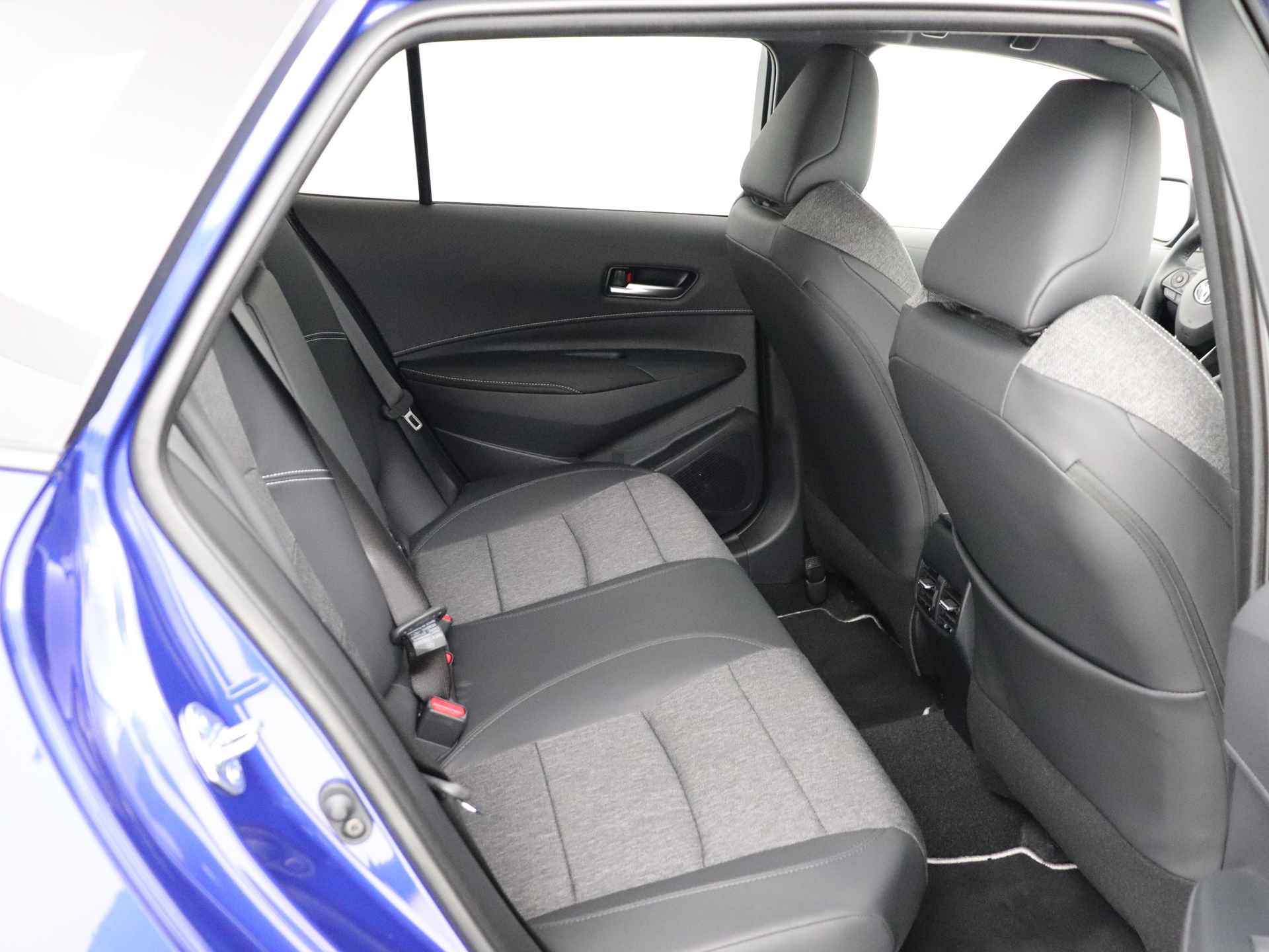 Toyota Corolla Touring Sports 1.8 Hybrid First Edition | Apple Carplay | Android Auto | Parkeersensoren | Half leder | - 13/44