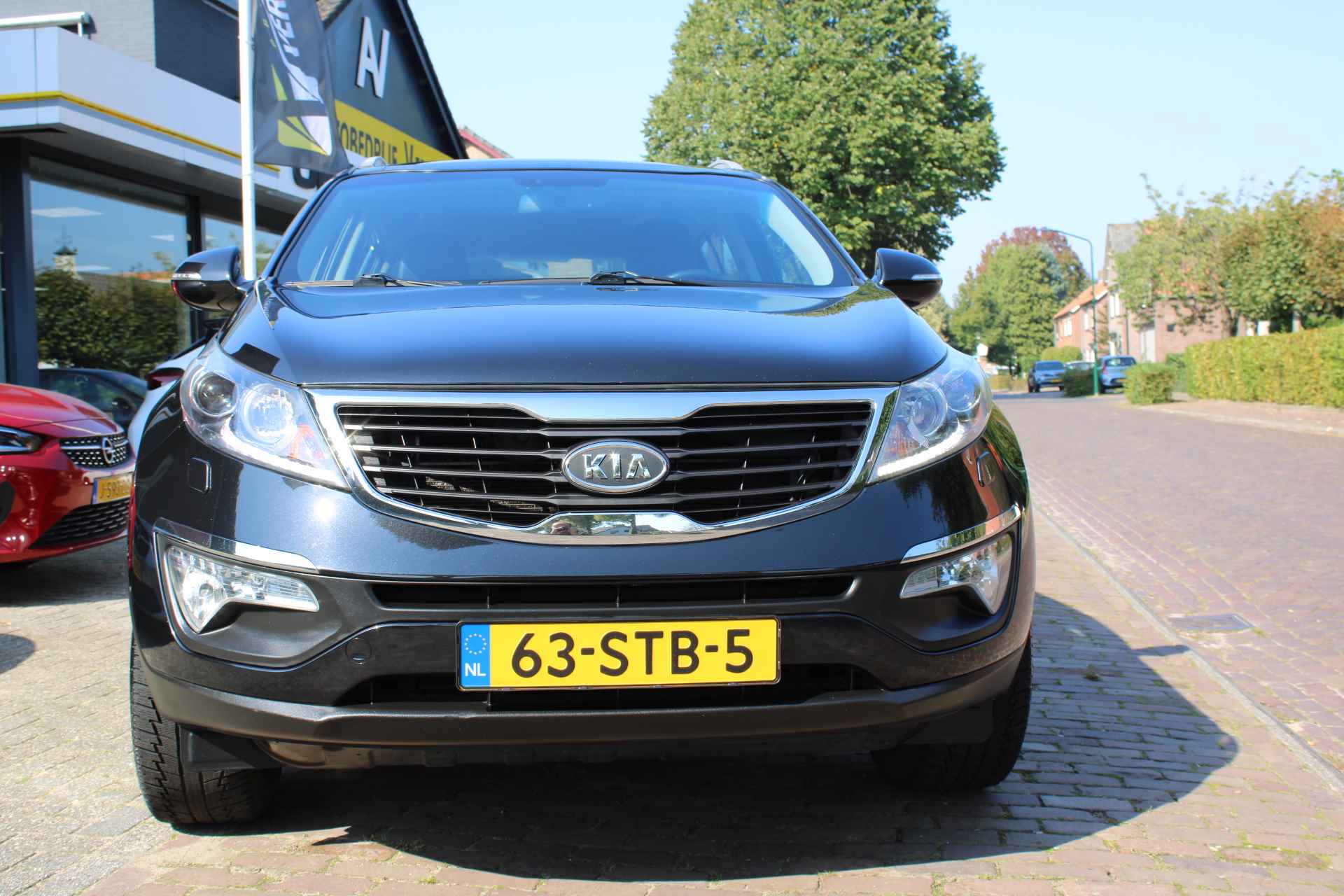 KIA Sportage 2.0 CVVT 2WD X-Clusive Automaat + 18"/ Navi/ Clima/ Cruise/ Panorama/ Leder/ NL auto - 6/46