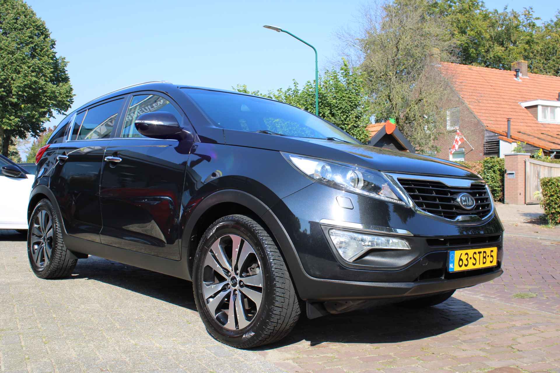 KIA Sportage 2.0 CVVT 2WD X-Clusive Automaat + 18"/ Navi/ Clima/ Cruise/ Panorama/ Leder/ NL auto - 7/46