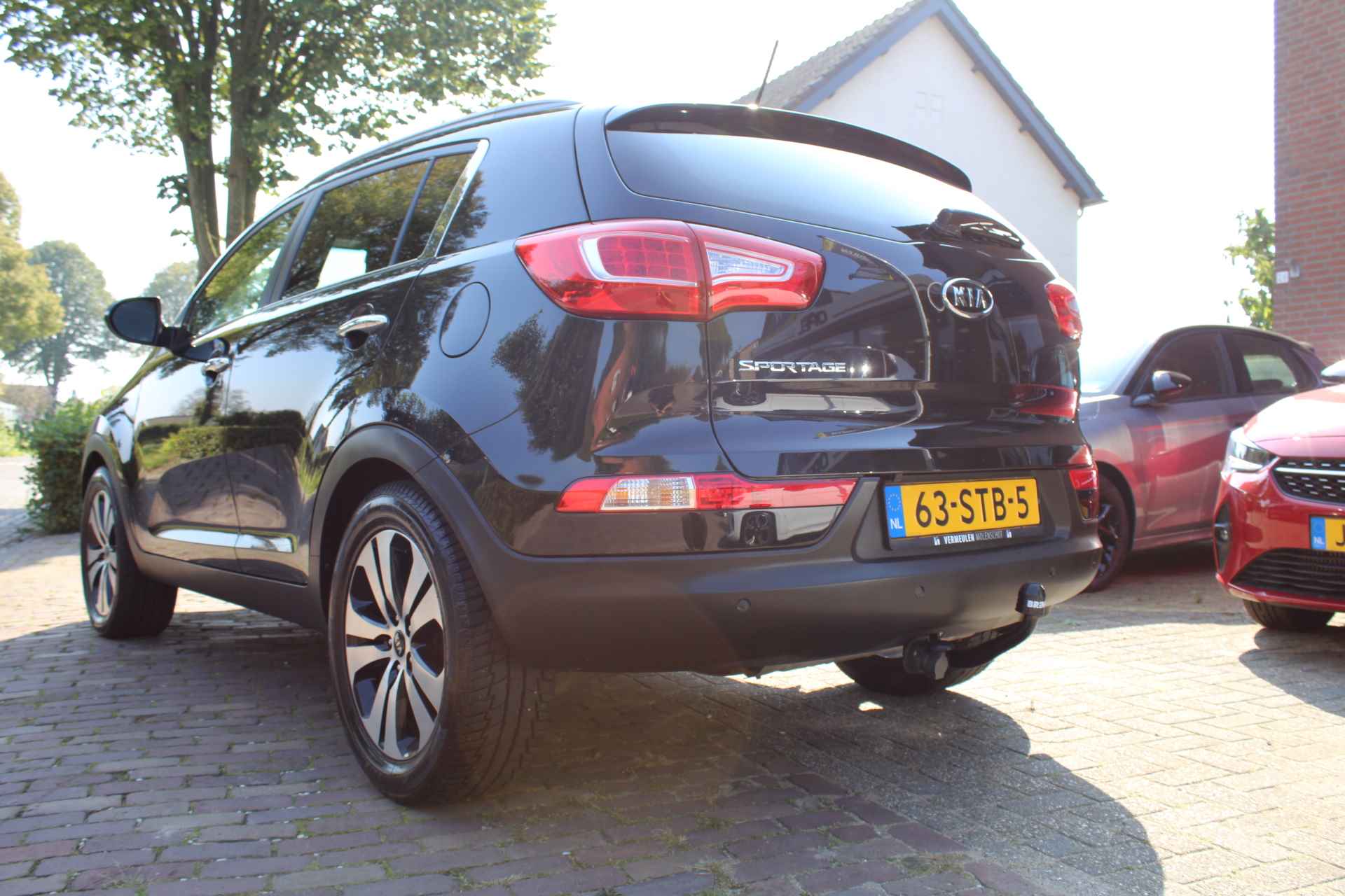 KIA Sportage 2.0 CVVT 2WD X-Clusive Automaat + 18"/ Navi/ Clima/ Cruise/ Panorama/ Leder/ NL auto - 9/46