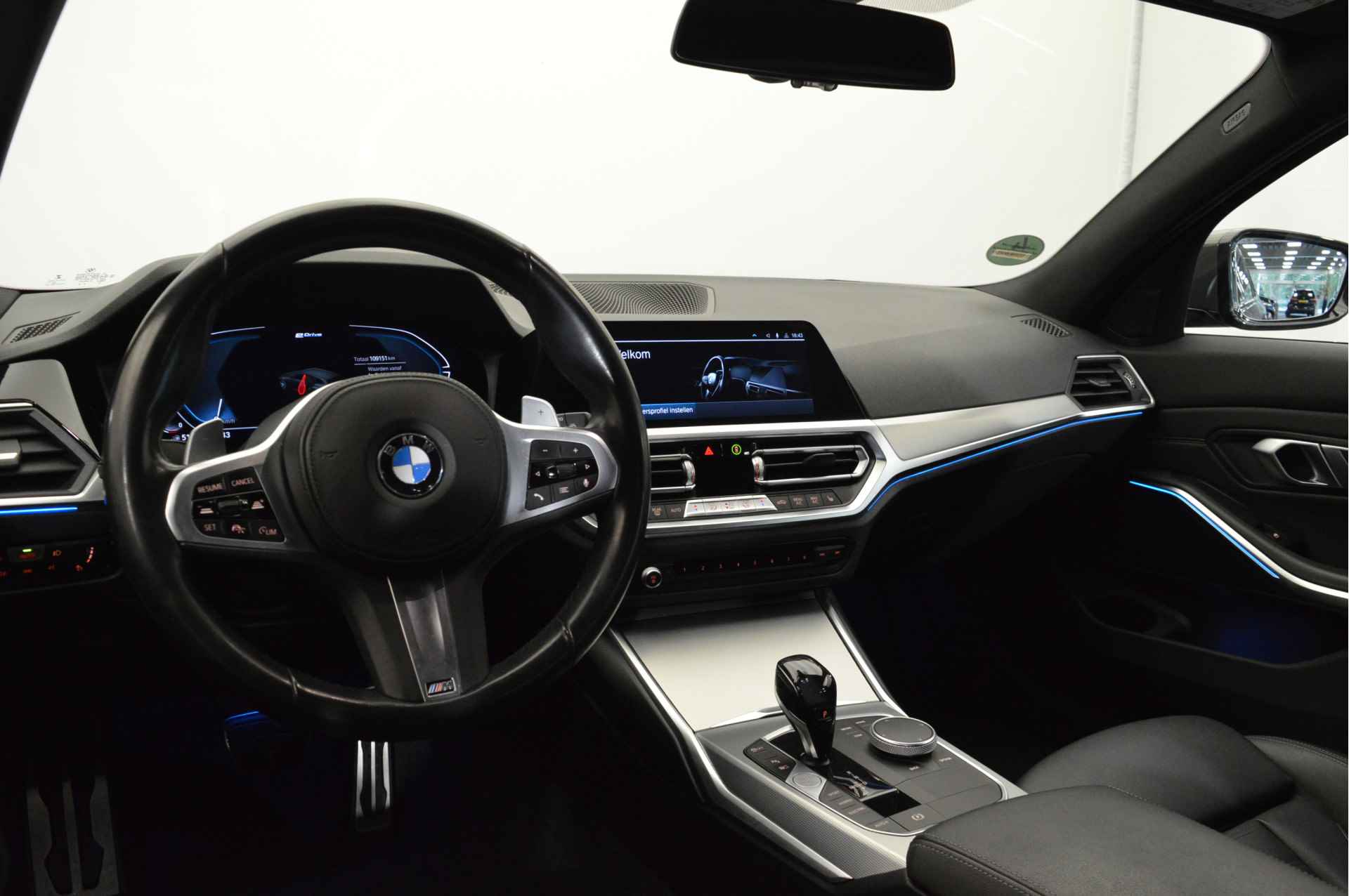 BMW 3 Serie Touring 330e High Executive M Sport Automaat / Sportstoelen / Active Cruise Control / LED / Parking Assistant / Live Cockpit Professional / Comfort Access - 8/23