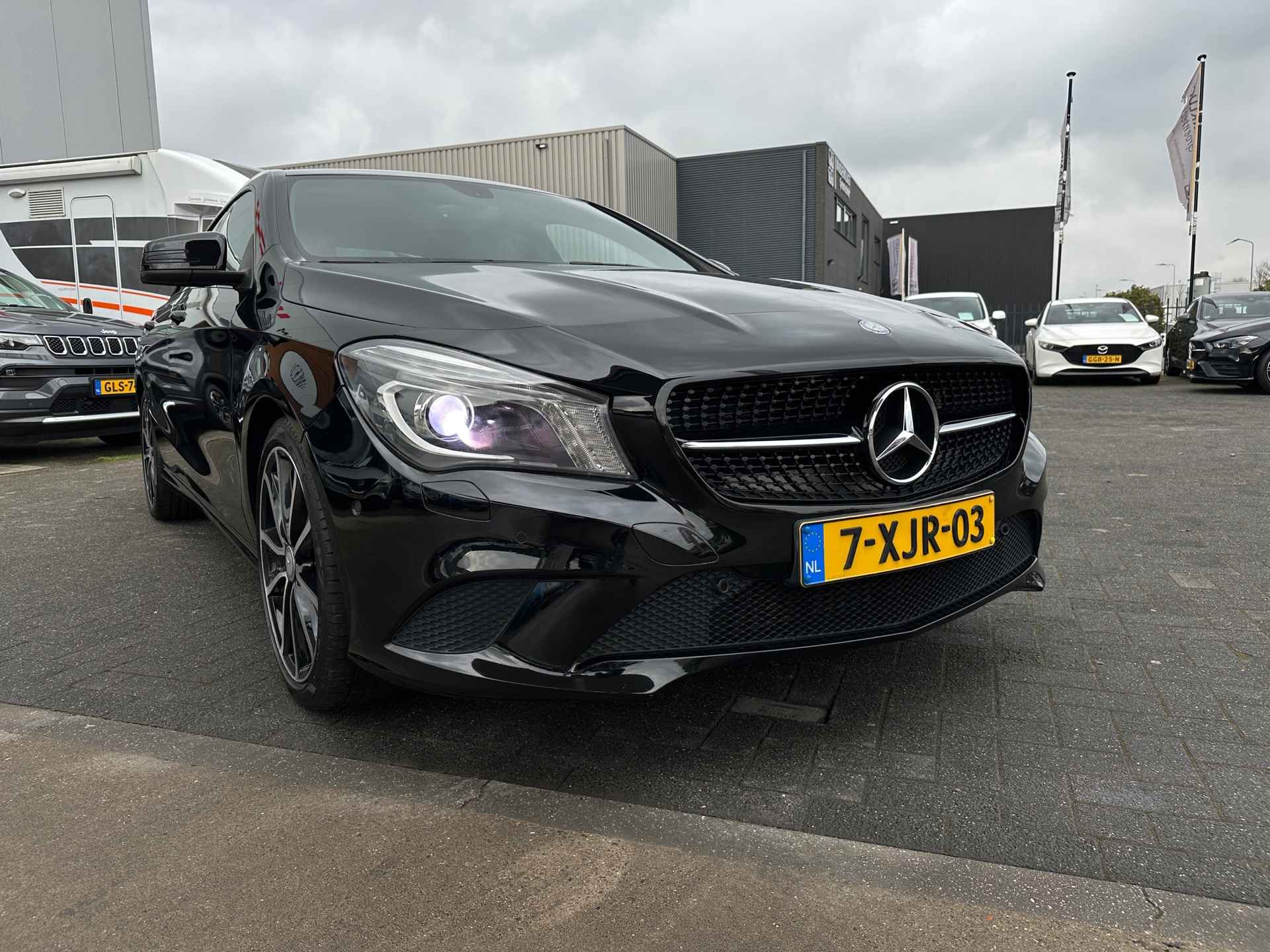 Mercedes-Benz CLA-klasse 180 Ambition|NL auto|Camera|Carplay|Sfeerverlichting|Xenon|18" lm|Sportstoelen - 19/33