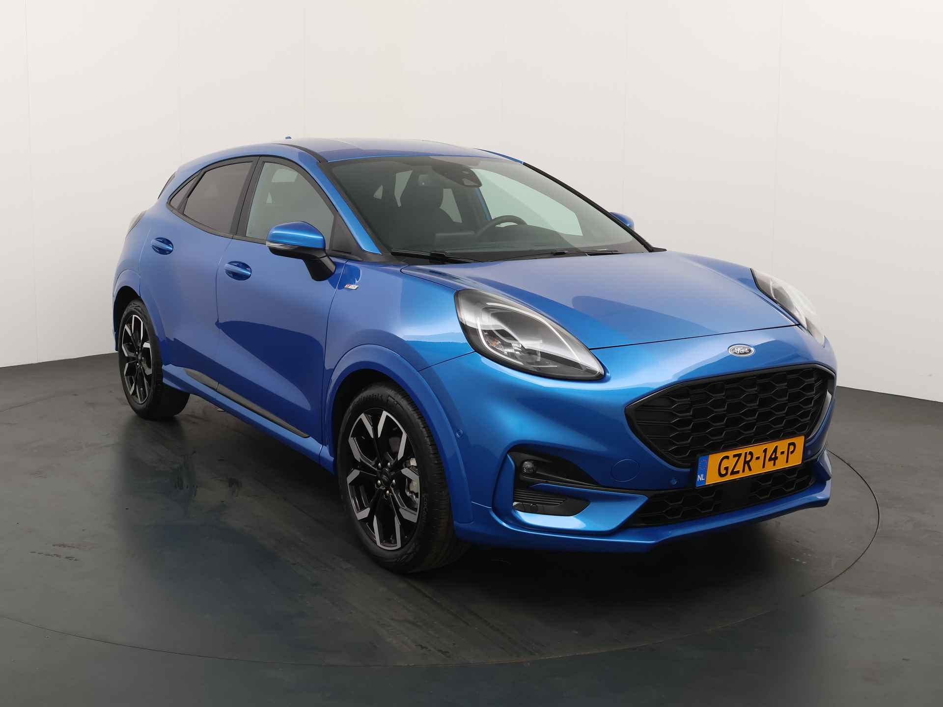 Ford Puma EcoBoost Hybrid 125 pk ST-Line X AUTOMAAT | Winter Pack | Adapt. cruise | B&O | LED | Camera | Half Leer | 18" - 7/21