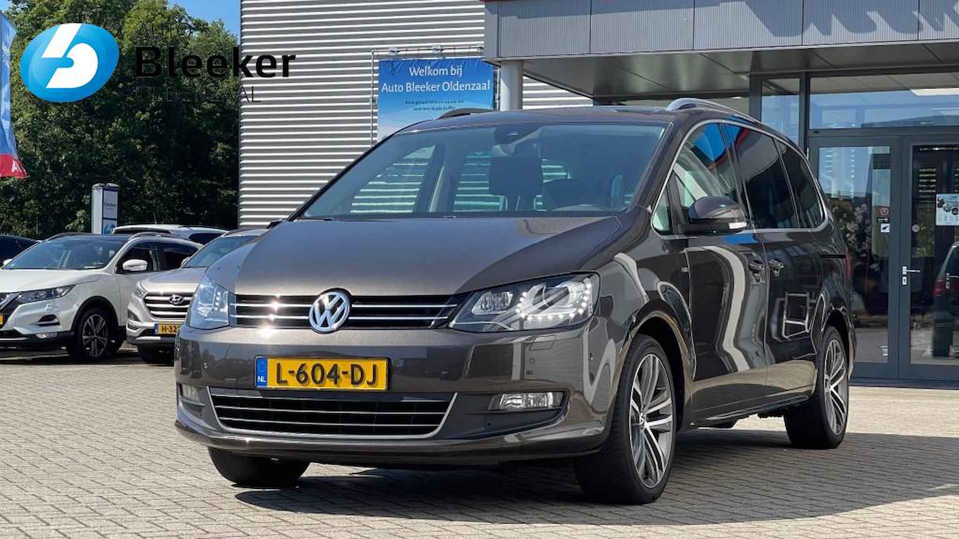 VOLKSWAGEN Sharan 1.4 TSI ComfortLine 7 pers Airco Navi Pano Cruise Stoelverwar - 14/35