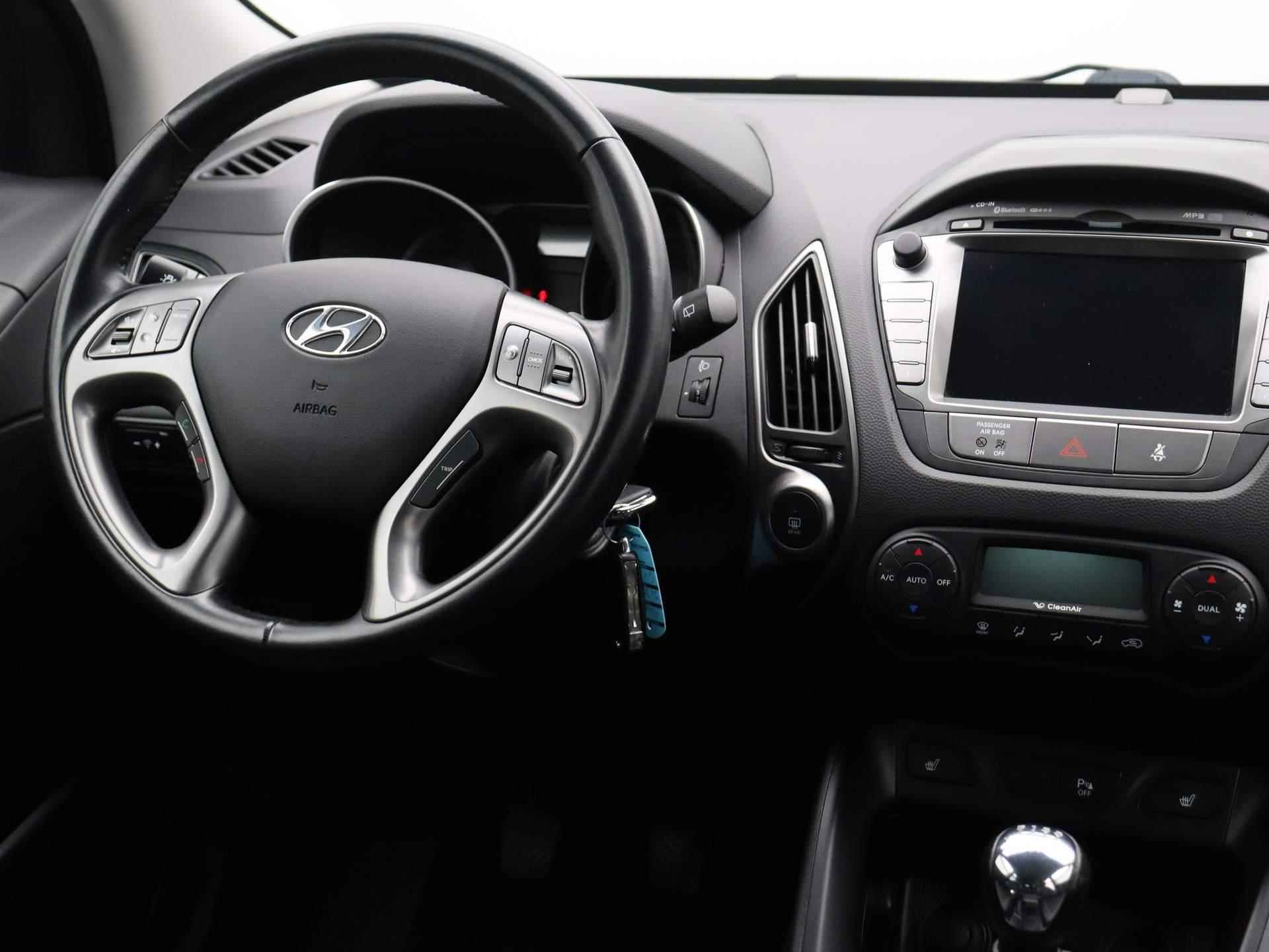 Hyundai ix35 1.6i GDI Go! | Trekhaak | Stoelverwarming | Climate control | Navigatie | - 5/36