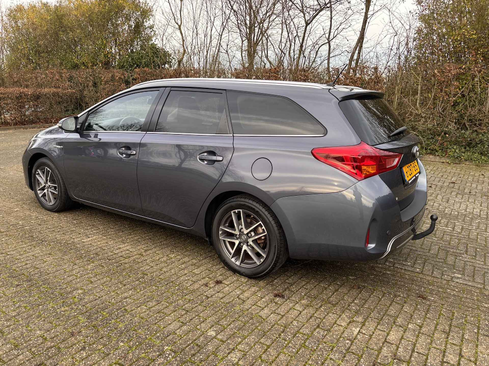 Toyota Auris Touring Sports 1.8 Hybrid Lease / Trekhaak/ Rijklaarprijs - 7/25