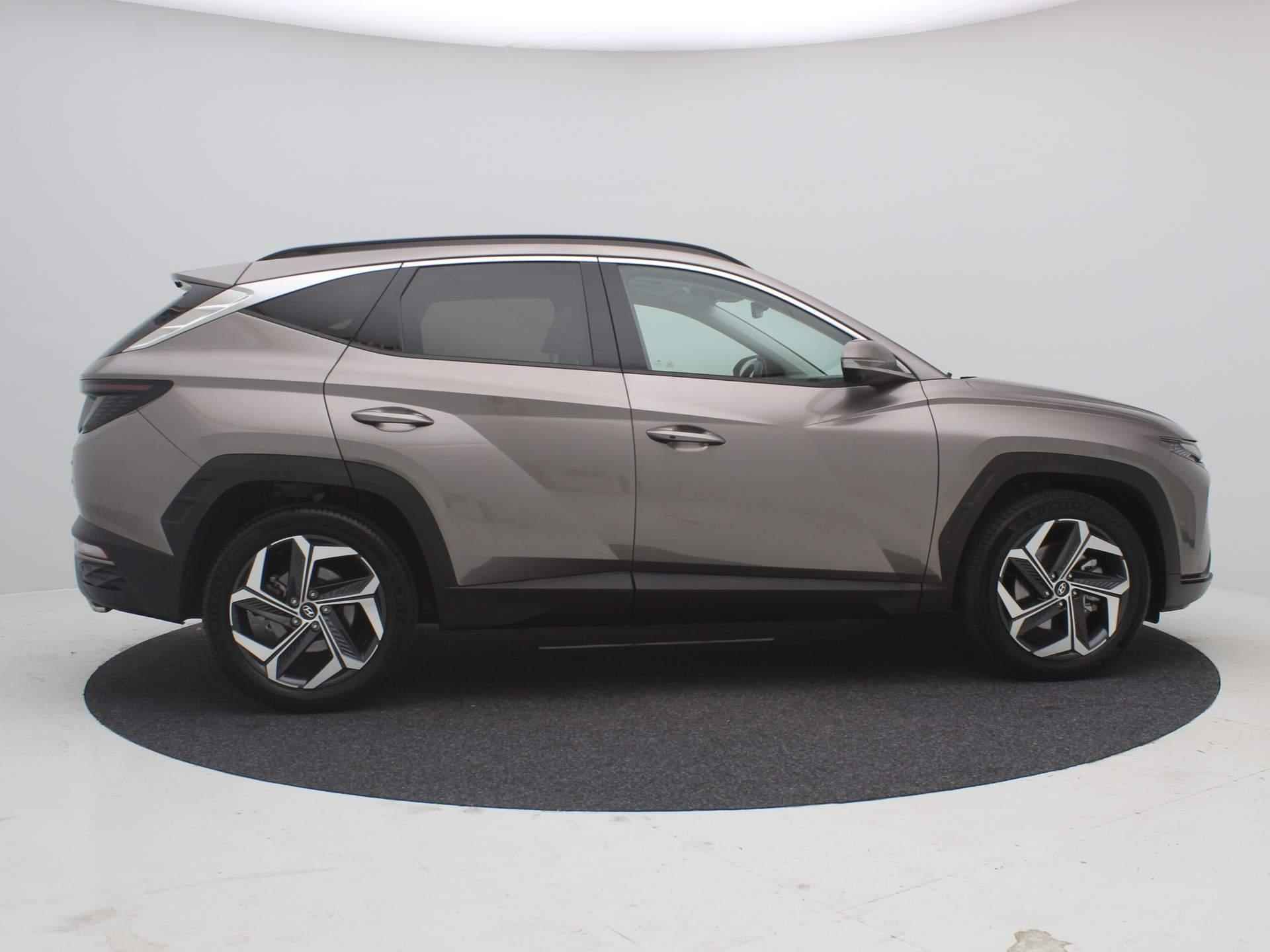 Hyundai Tucson 1.6 T-GDI HEV 230pk  Premium Sky / Trekhaak (1650KG Trekgewicht) / Schuif-/Kanteldak / Elektrische Achterklep / Rondomzicht Camera / Cruise Control Adaptief / NL Auto / Dealer onderhouden / - 11/77