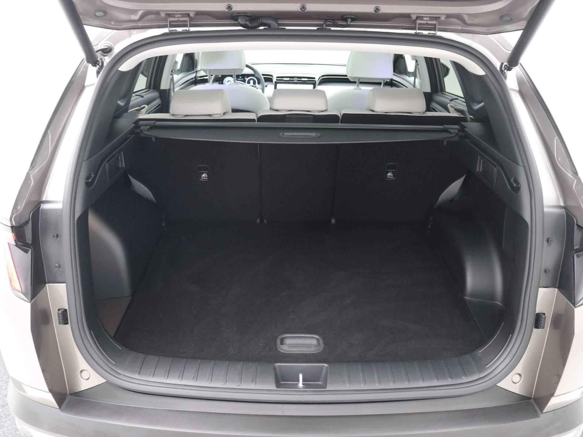 Hyundai Tucson 1.6 T-GDI HEV 230pk  Premium Sky / Trekhaak (1650KG Trekgewicht) / Schuif-/Kanteldak / Elektrische Achterklep / Rondomzicht Camera / Cruise Control Adaptief / NL Auto / Dealer onderhouden / - 18/77