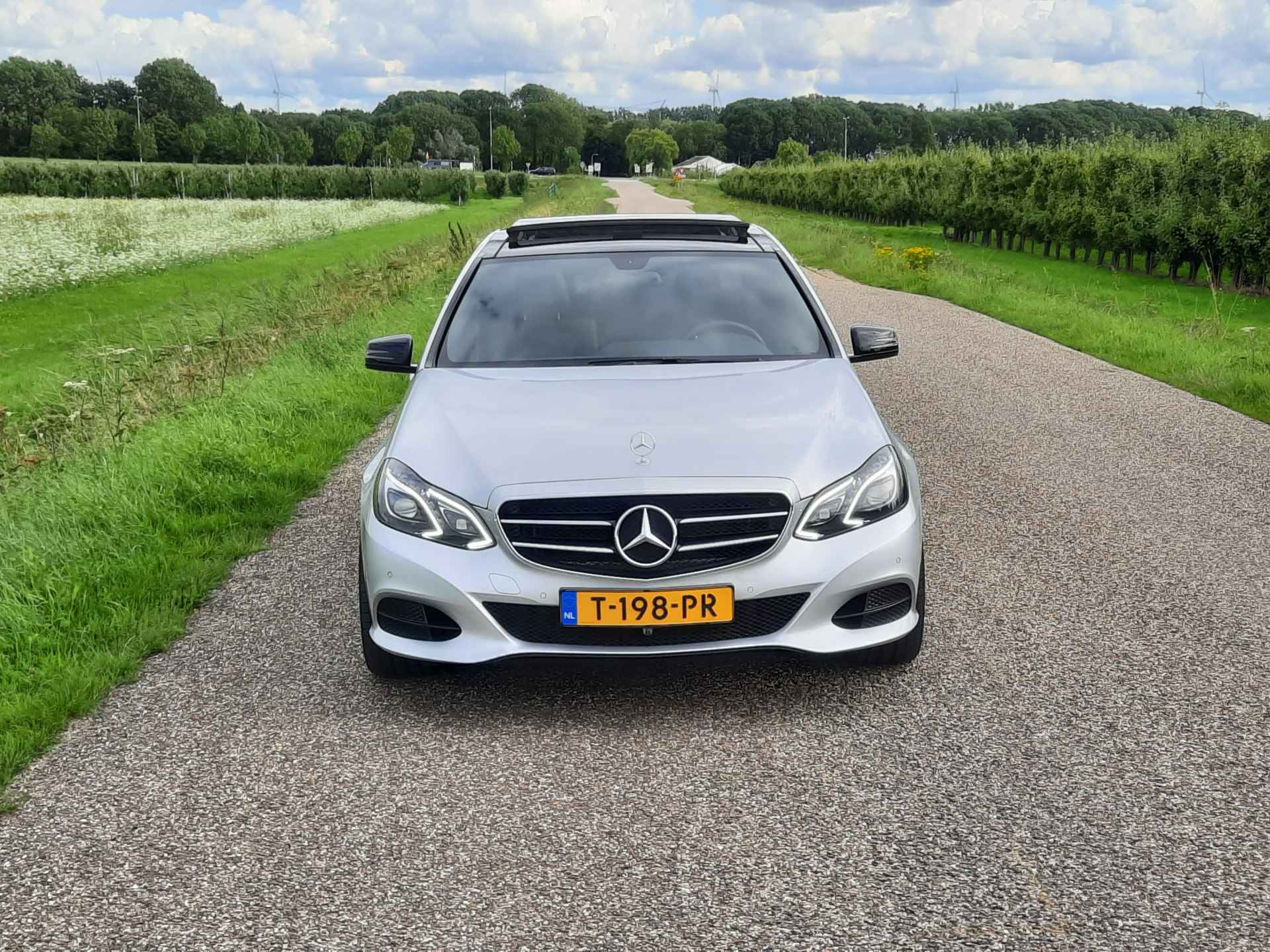 Mercedes-Benz E-Klasse 200 Prestige Avantgarde Lage Km stand! | Clima | Pano | Navi | Cruise | Parkeerhulp | Camera - 5/43