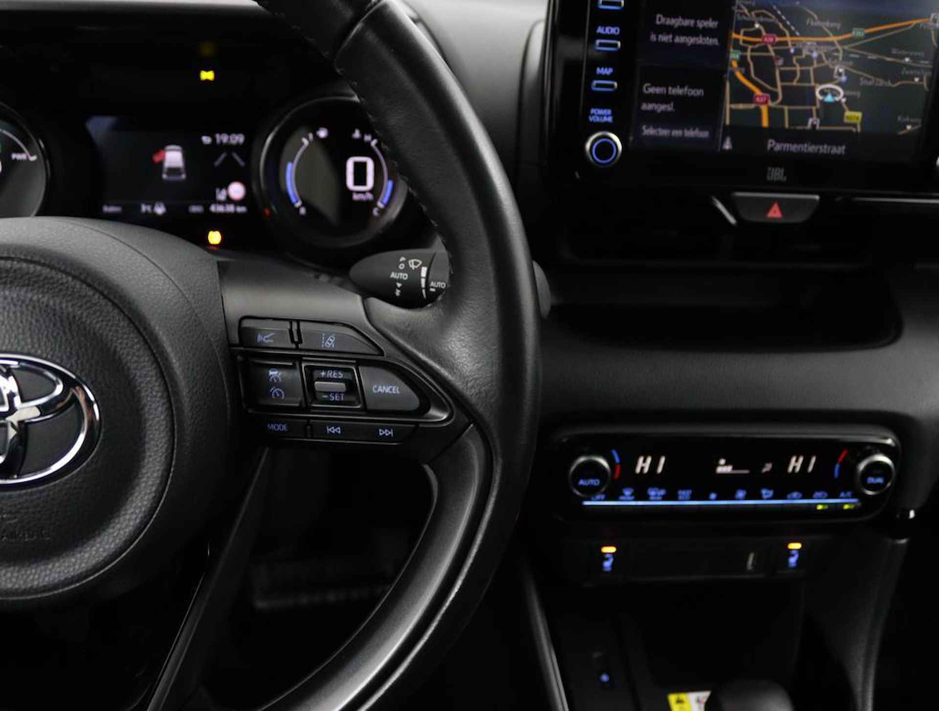 Toyota Yaris 1.5 Hybrid Executive | Navigatie | Climate-Control | Apple Carplay/Android Auto | Blindsport-Monitor | Parkeersensoren | Stootlijsten | - 28/57