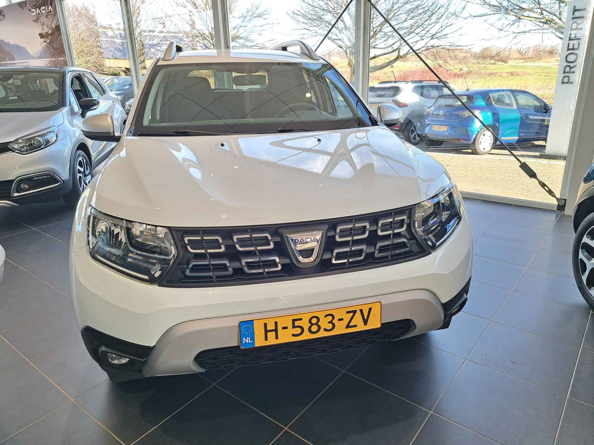 Dacia Duster 1.3 TCe 130 pk Prestige | Climat Control | Navigatie | Camera | Cruise | 1.500 kg trekgewicht | Treeplank | incl. Bovag rijklaarpakket met 12 maanden garantie | - 6/25