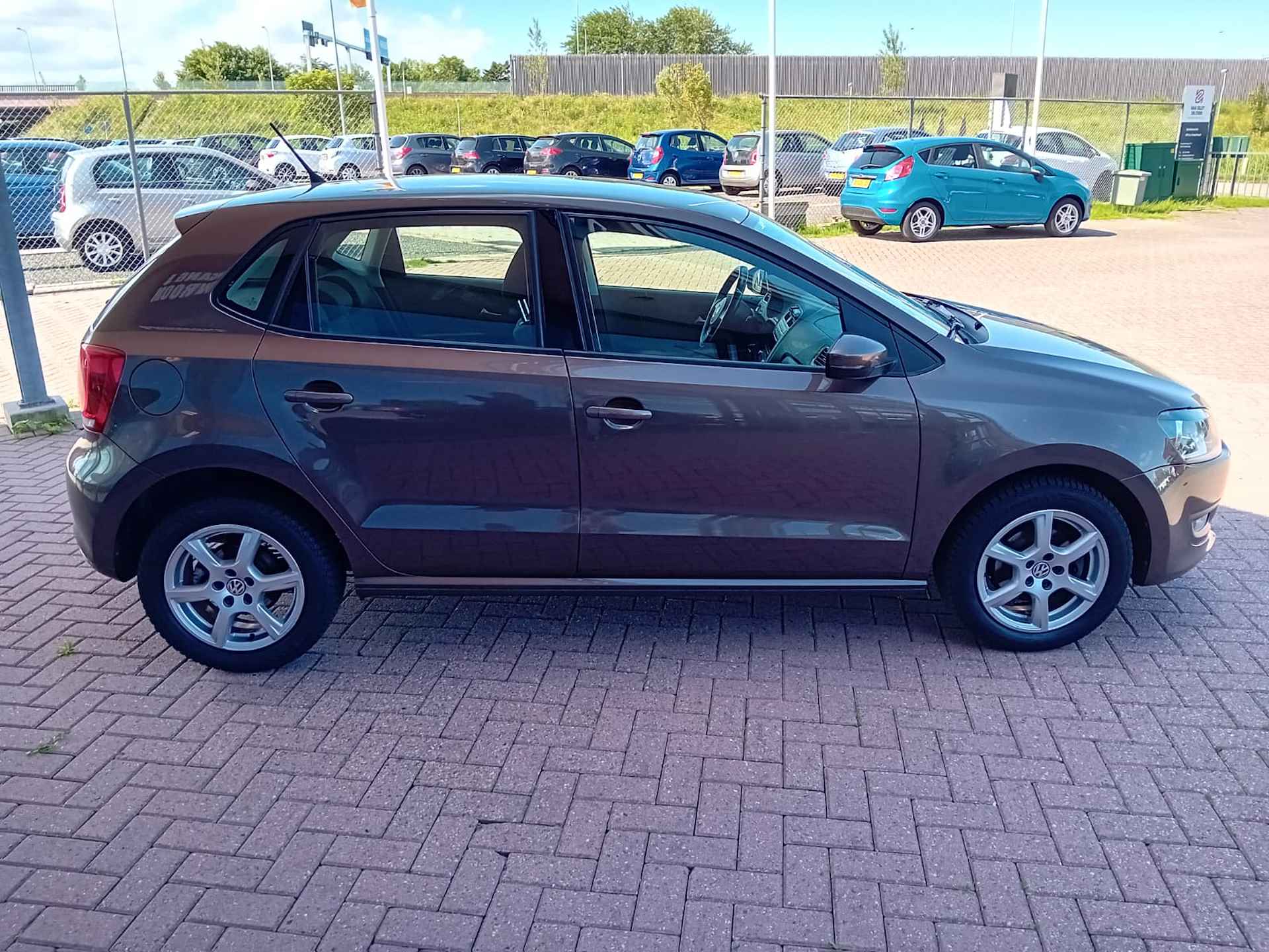 Volkswagen Polo 1.2 TSI Comfortline, Airco, Multimedia systeem, Parkeersensoren, Cruise control, Elektrische ramen en spiegels, Centrale vergren Zeer nette auto, BOVAG - 5/26