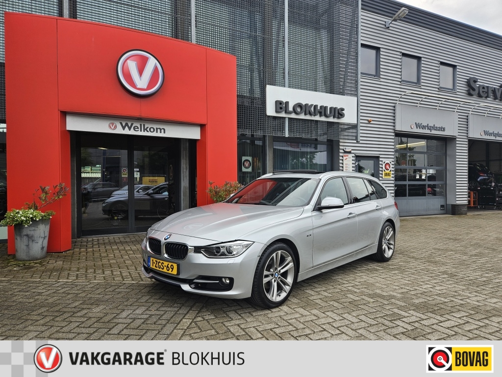 Bmw 3-serie Touring 320i High Executive | Panodak | Navi