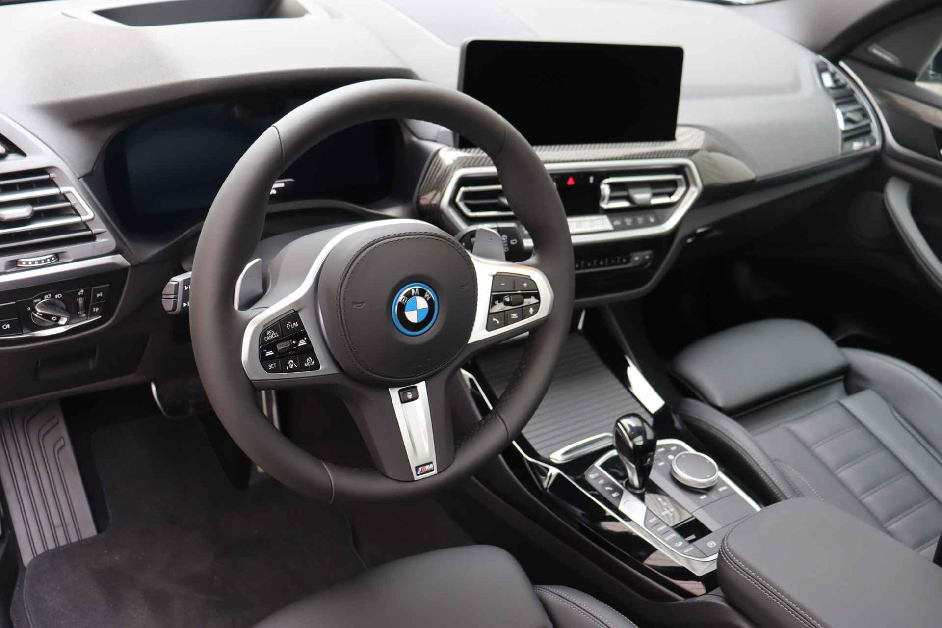 BMW X3 xDrive30e High Executive M Sport Automaat / Panoramadak / Trekhaak / Sportstoelen / Parking Assistant Plus / Driving Assistant Professional / Head-Up / Harman Kardon - 12/22