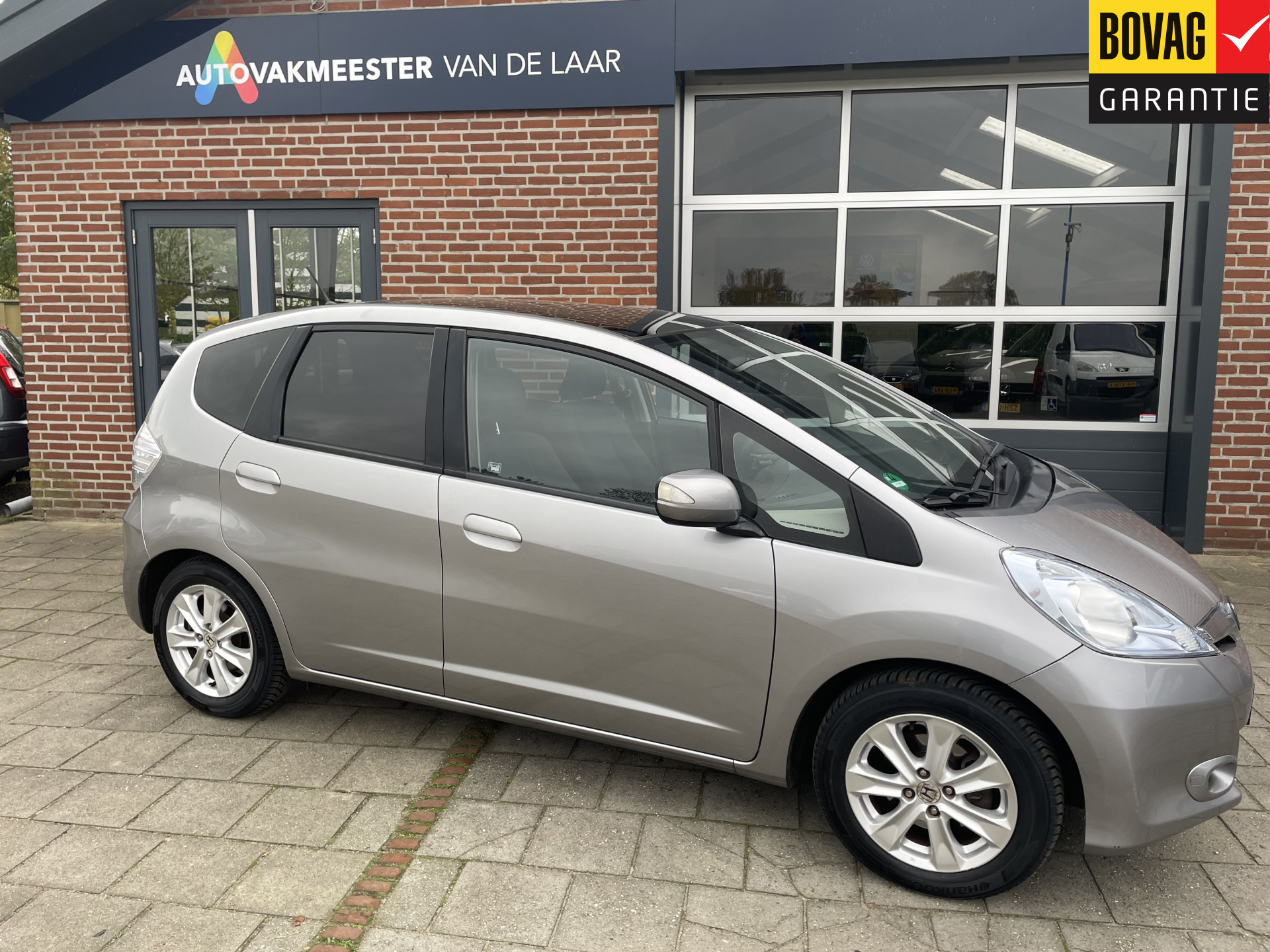 Honda Jazz 1.4 Hybrid Elegance Automaat ( Cruise Control, Achteruitrijcamera, Fietsendrager) RIJKLAARPRIJS!