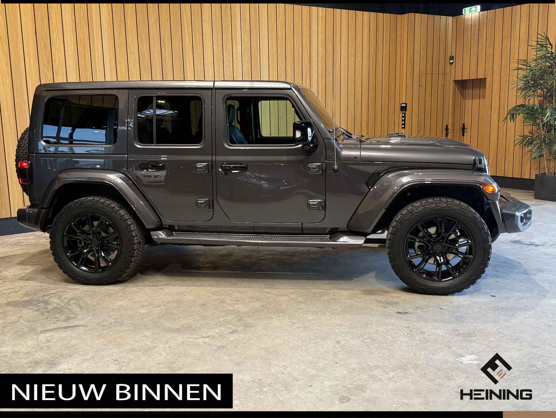 Jeep Wrangler Unlimited 4xe 380 Sahara. 20 inch. Leer. Navi. Hollandse auto met NAP - 55/56