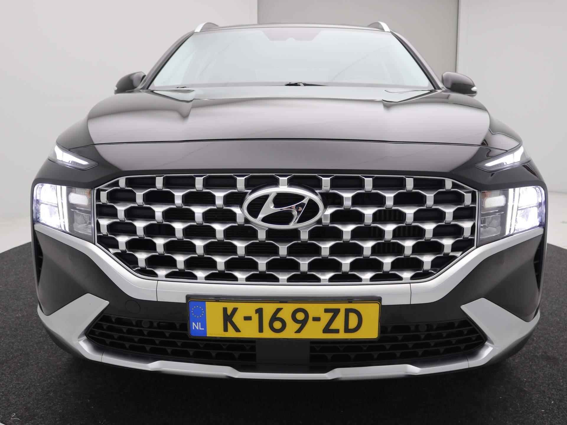 Hyundai Santa Fe 1.6 T-GDI HEV Comfort Smart 7-Persoons / Trekhaak / Lederen bekleding / 7-persoons / Dealer onderhouden / LMV / Adaptieve Cruise Control / Navigatie / - 61/69