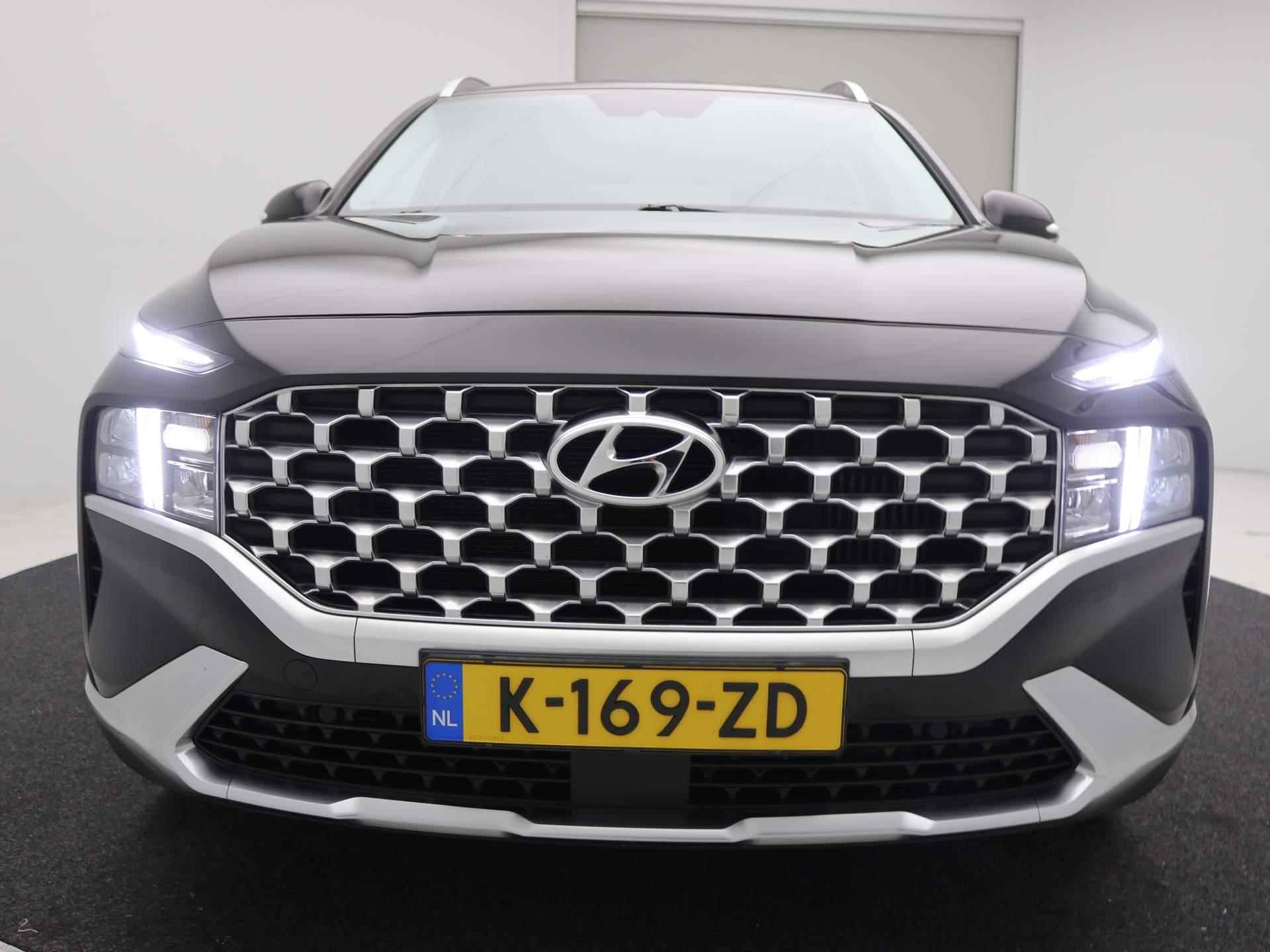 Hyundai Santa Fe 1.6 T-GDI HEV Comfort Smart 7-Persoons / Trekhaak / Lederen bekleding / 7-persoons / Dealer onderhouden / LMV / Adaptieve Cruise Control / Navigatie / - 63/69