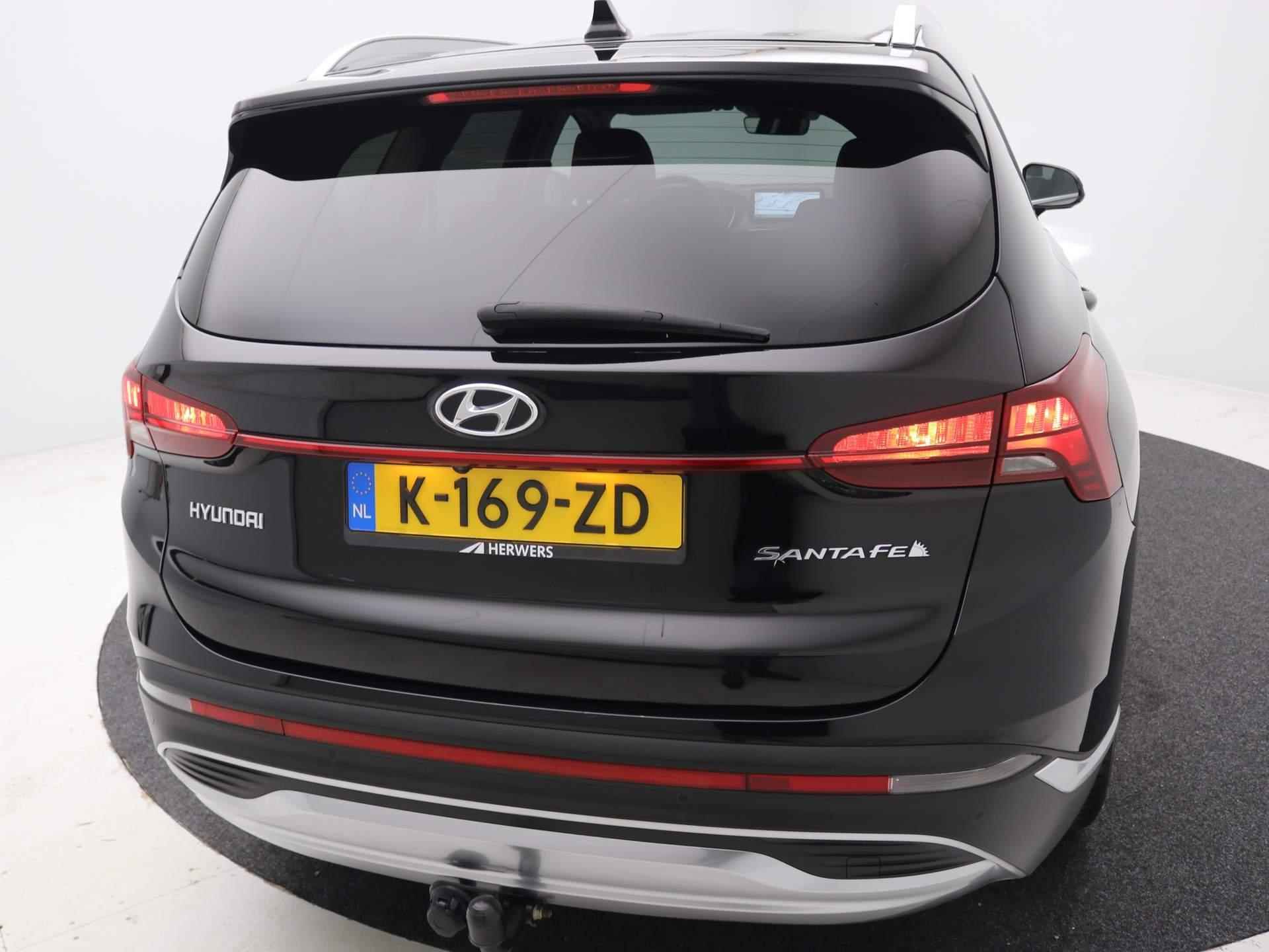 Hyundai Santa Fe 1.6 T-GDI HEV Comfort Smart 7-Persoons / Trekhaak / Lederen bekleding / 7-persoons / Dealer onderhouden / LMV / Adaptieve Cruise Control / Navigatie / - 67/69