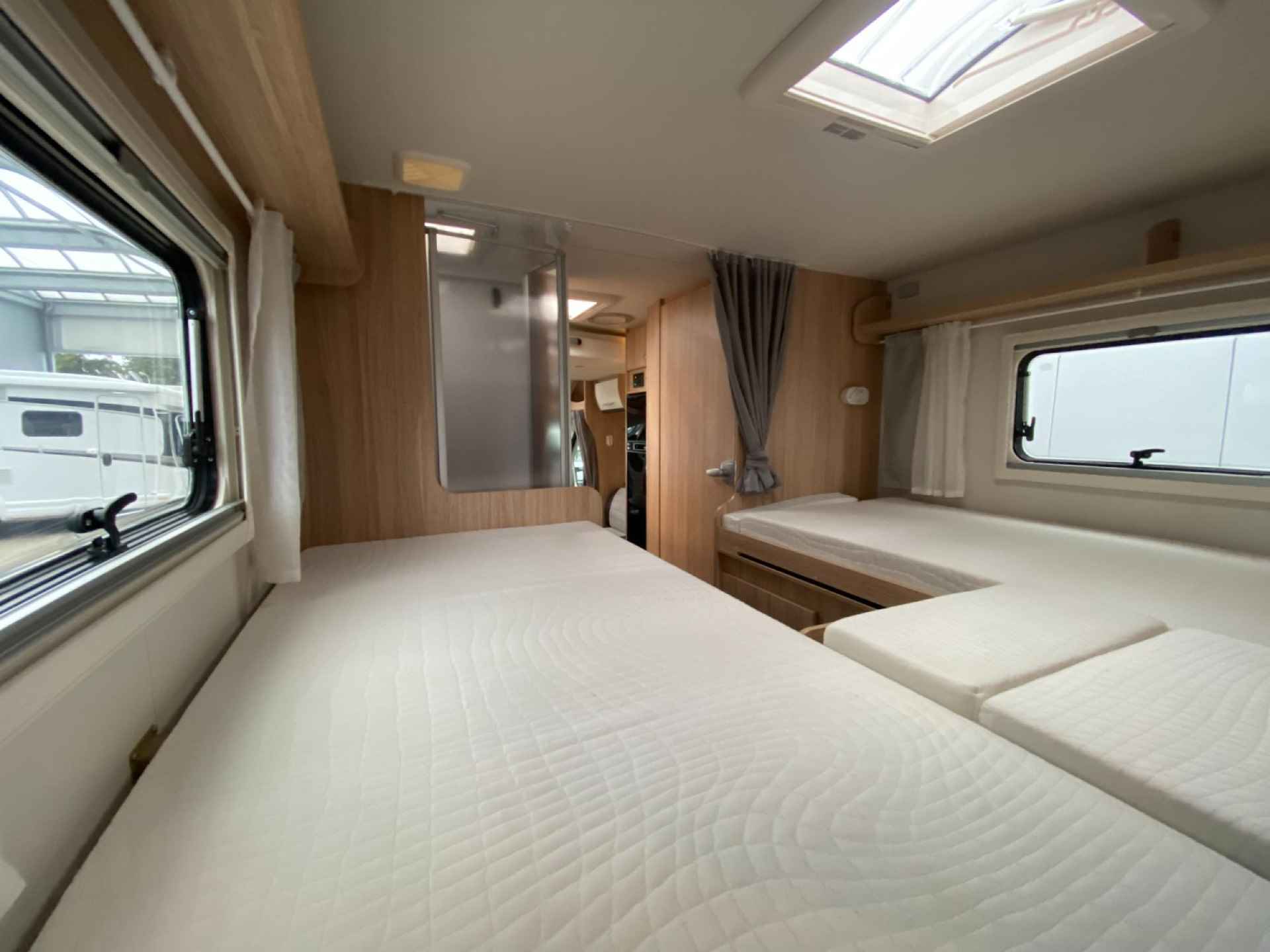 Hymer Sunlight T68 Enkele bedden Hefbed INCL. STALLING - 26/35