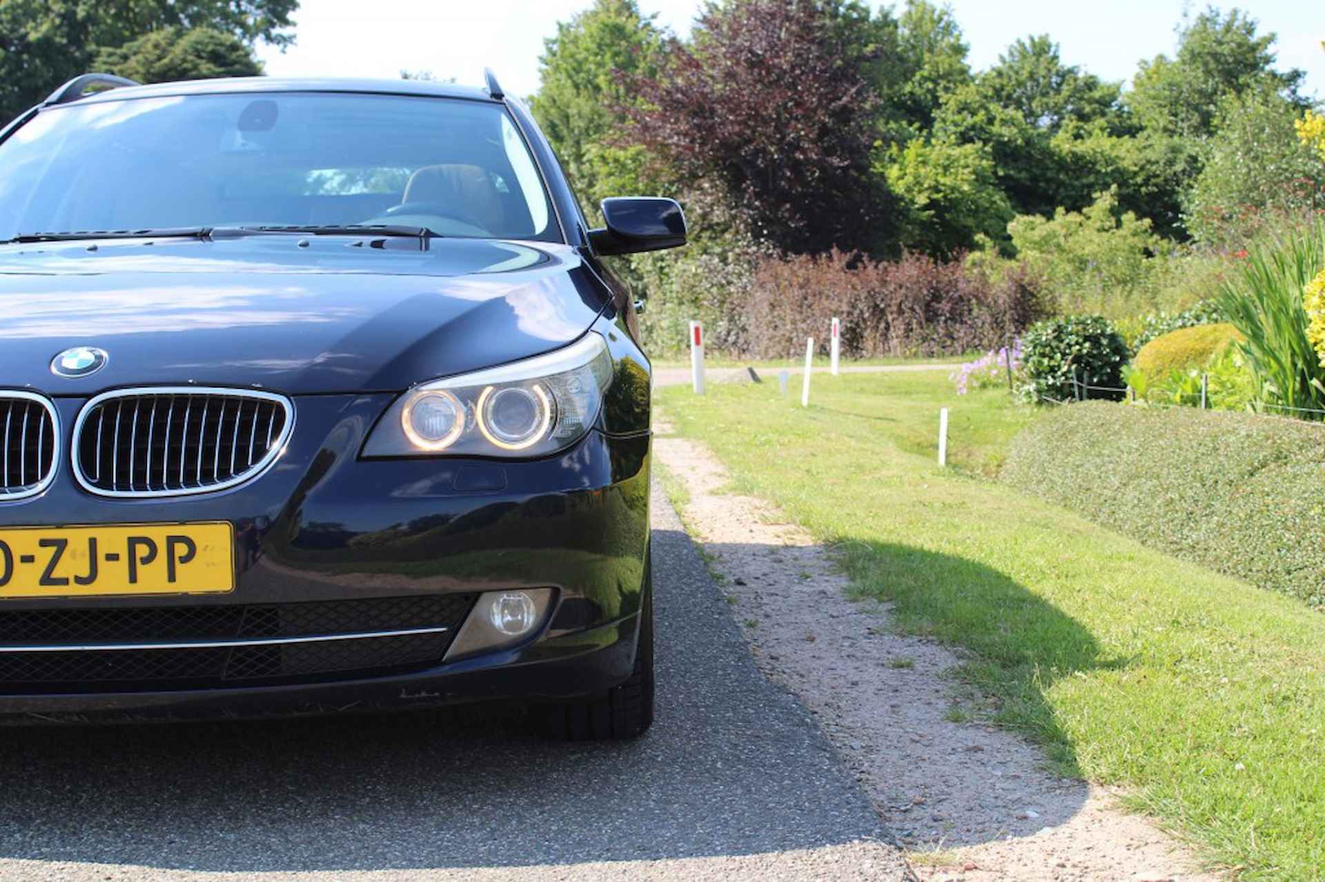 BMW 5-serie 523i 190pk High Executive automaat ECC/navi/leer/xenon/panodak - 29/38