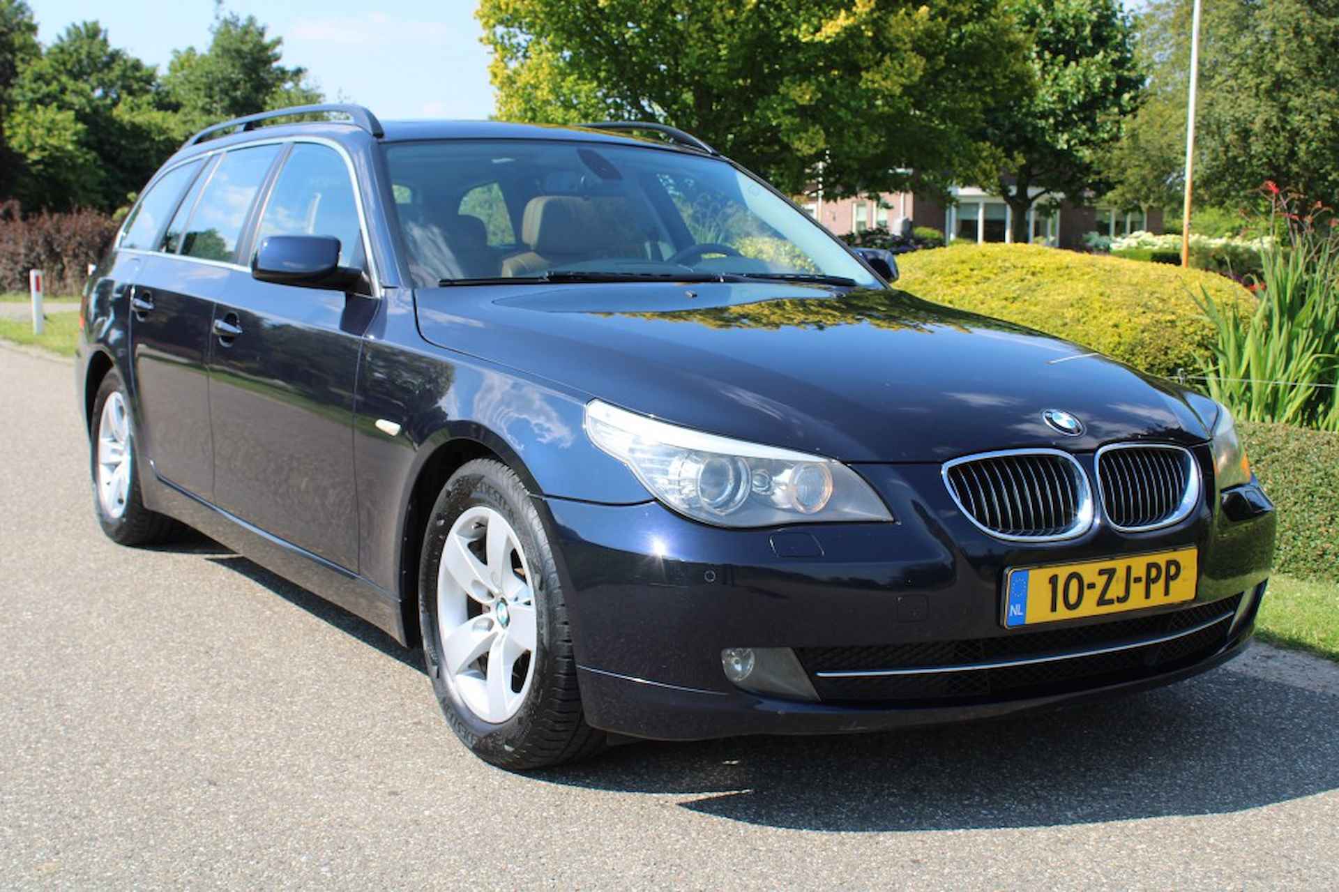 BMW 5-serie 523i 190pk High Executive automaat ECC/navi/leer/xenon/panodak - 36/38