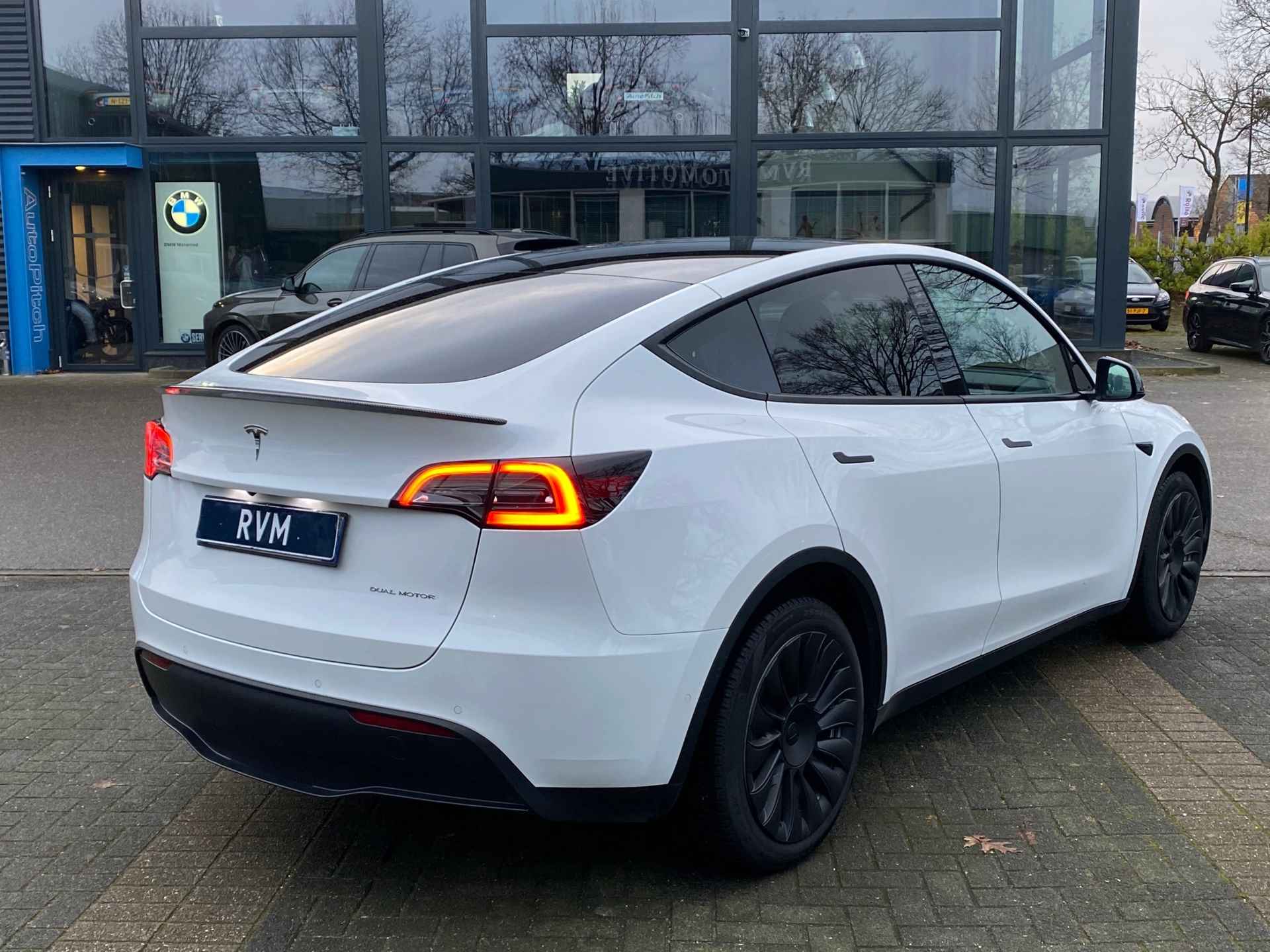 Tesla Model Y Long Range AWD 75 kWh VAN 38.900 VOOR 35.877 EINDEJAARSVOORDEEL 3.023,- | AUTOPILOT | LEDER | PANO | ELEK. KOFFER - 5/40