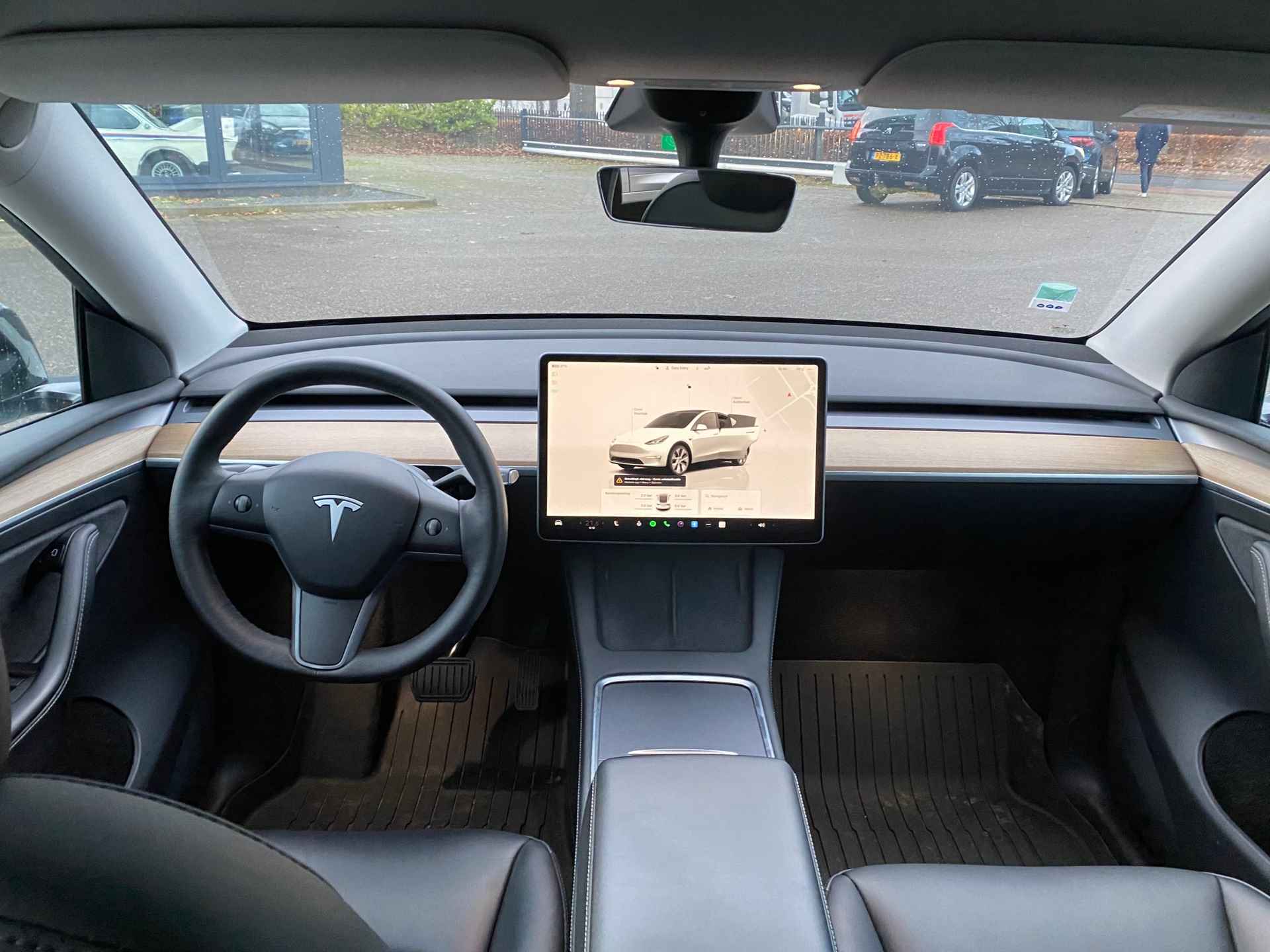 Tesla Model Y Long Range AWD 75 kWh VAN 38.900 VOOR 35.877 EINDEJAARSVOORDEEL 3.023,- | AUTOPILOT | LEDER | PANO | ELEK. KOFFER - 15/40