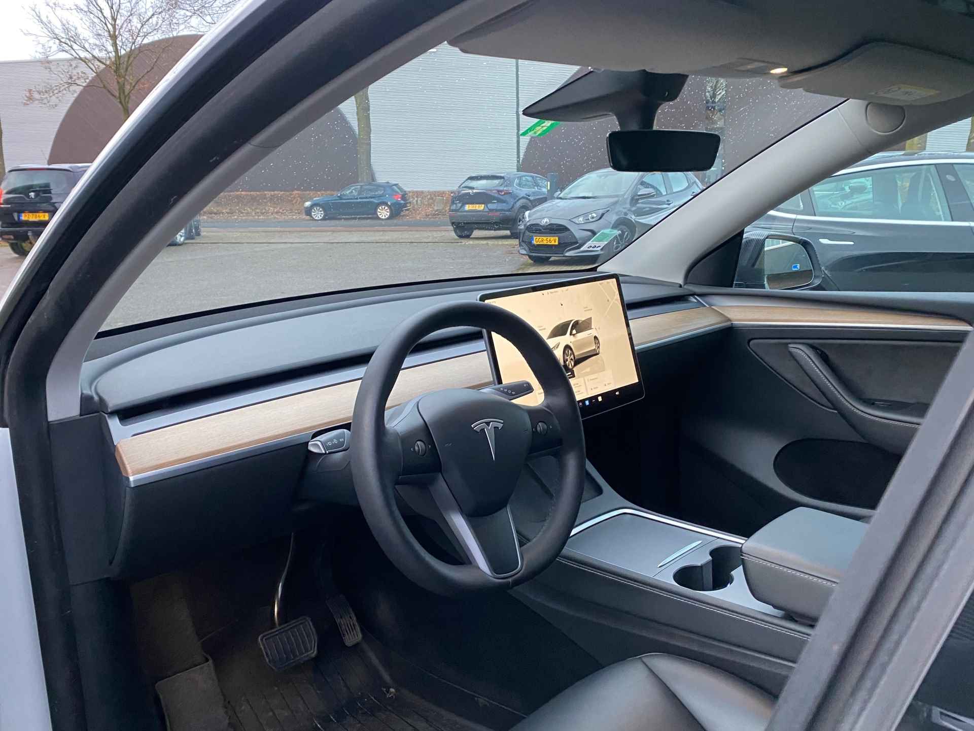 Tesla Model Y Long Range AWD 75 kWh VAN 38.900 VOOR 35.877 EINDEJAARSVOORDEEL 3.023,- | AUTOPILOT | LEDER | PANO | ELEK. KOFFER - 17/40