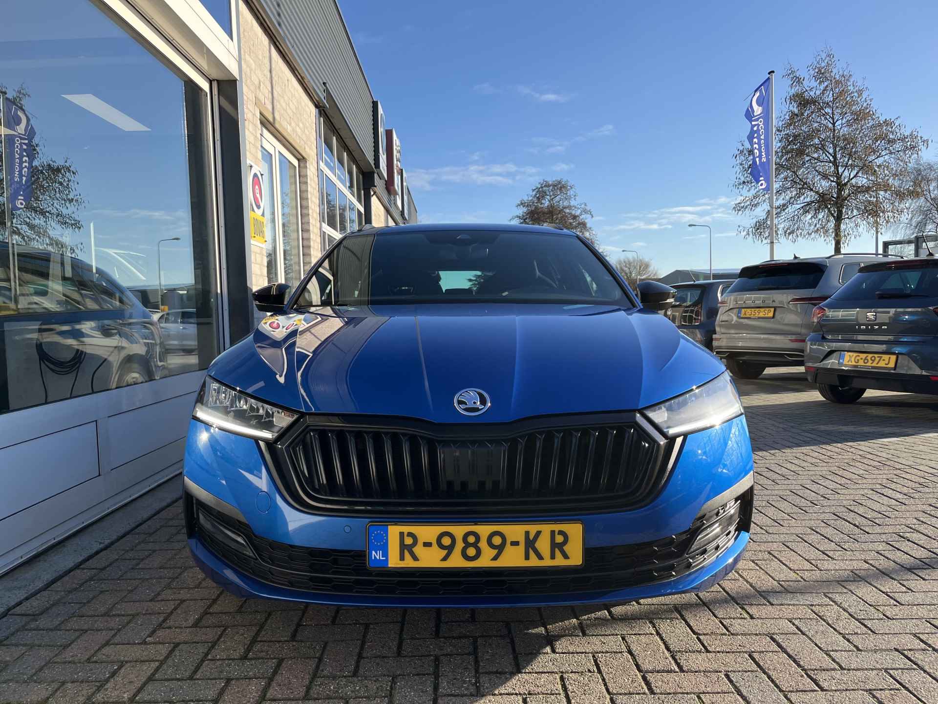 Škoda Octavia Combi 1.0 TSI Sport Business / FABRIEKSGARANTIE TOT 10-2026/ CRUISE/ DIGITAL DASH/ NAVI/ PARK. SENSOREN/ DAB/ SMARTLINK/ CLIMA/ TREKHAAK - 32/37