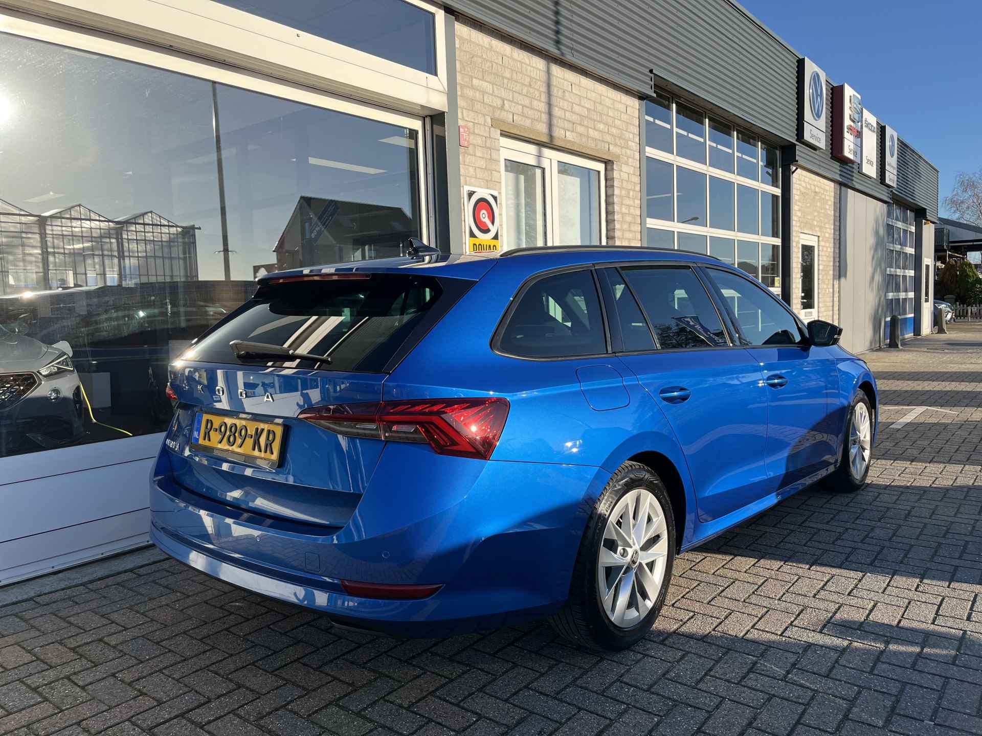 Škoda Octavia Combi 1.0 TSI Sport Business / FABRIEKSGARANTIE TOT 10-2026/ CRUISE/ DIGITAL DASH/ NAVI/ PARK. SENSOREN/ DAB/ SMARTLINK/ CLIMA/ TREKHAAK - 33/37