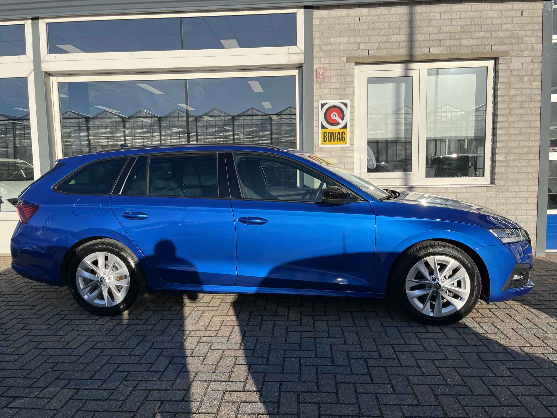 Škoda Octavia Combi 1.0 TSI Sport Business / FABRIEKSGARANTIE TOT 10-2026/ CRUISE/ DIGITAL DASH/ NAVI/ PARK. SENSOREN/ DAB/ SMARTLINK/ CLIMA/ TREKHAAK - 34/37