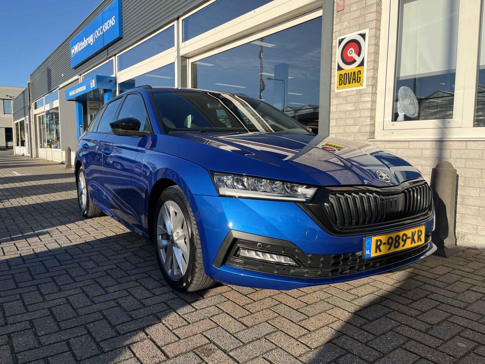 Škoda Octavia Combi 1.0 TSI Sport Business / FABRIEKSGARANTIE TOT 10-2026/ CRUISE/ DIGITAL DASH/ NAVI/ PARK. SENSOREN/ DAB/ SMARTLINK/ CLIMA/ TREKHAAK - 35/37