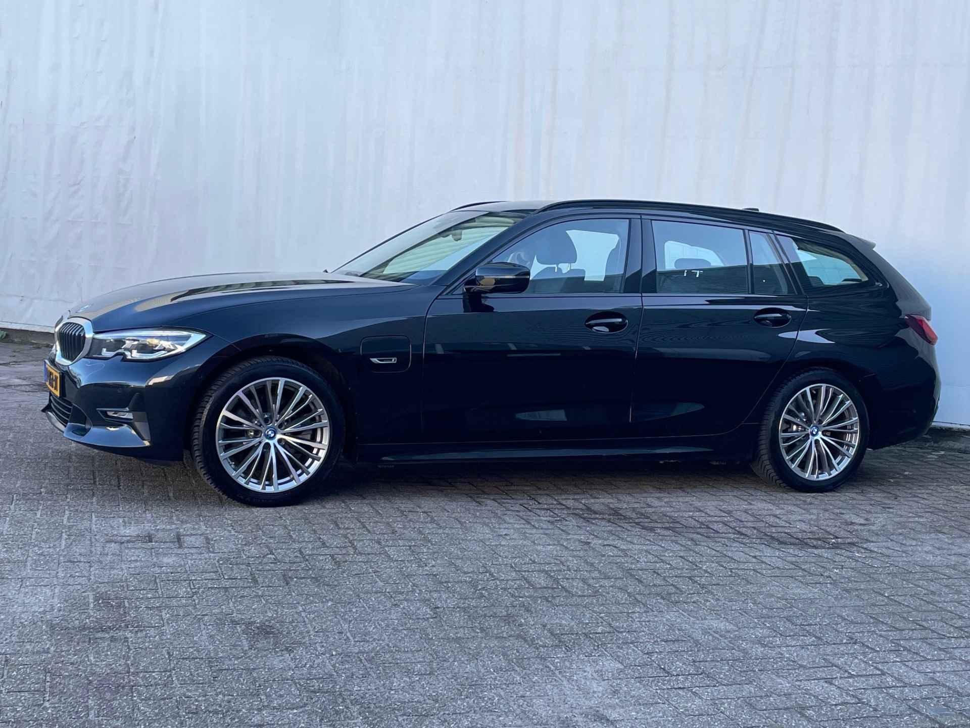 BMW 3 Serie Touring 320e Business Ed. Plus/ Sportline/ leder/18"vlg - 3/26