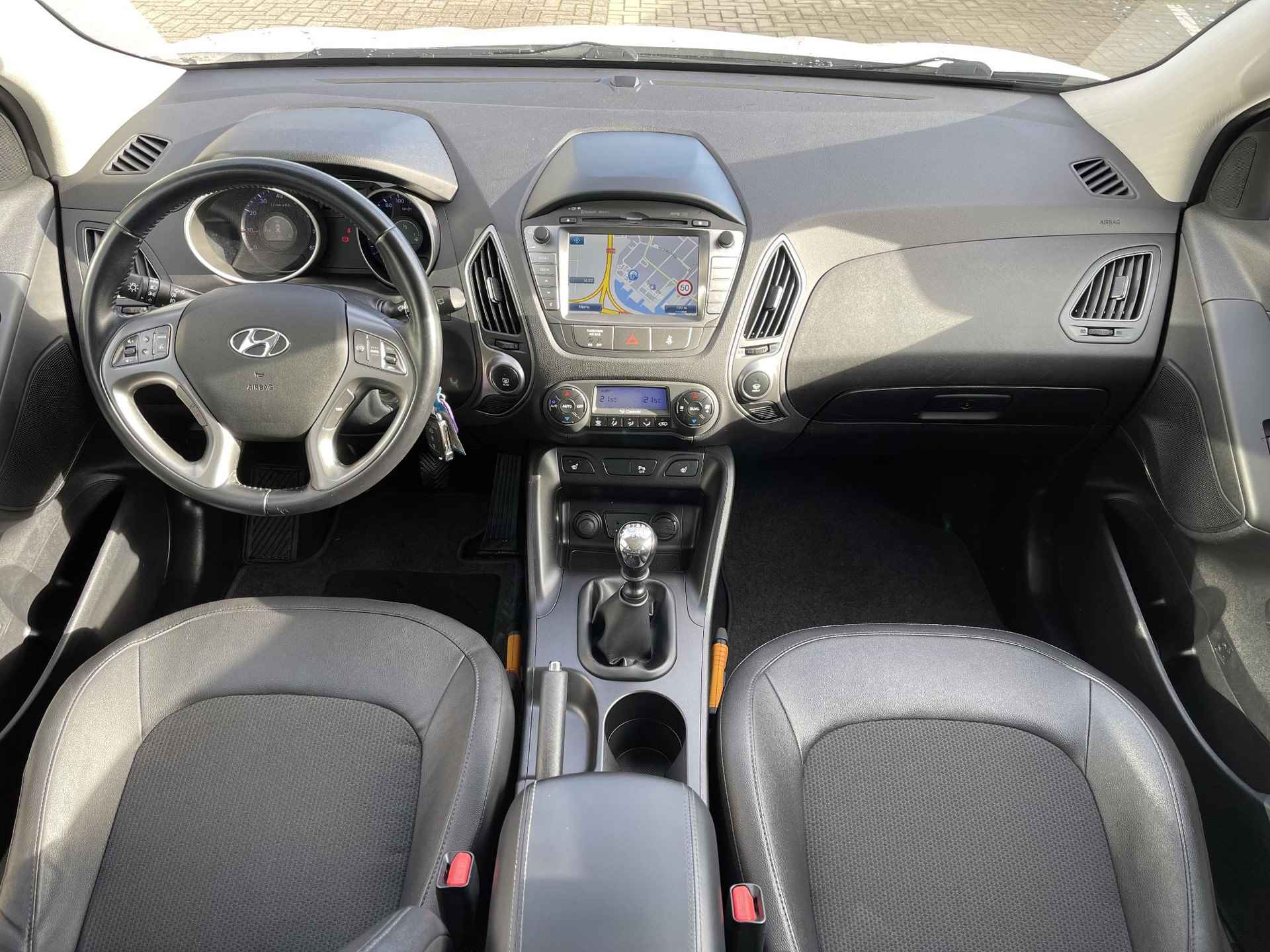 Hyundai ix35 1.6i GDI Go! | Navigatie | Camera | Stoelverwarming | ½ Leder | Park. Sensor | Cruise & Climate Control | Rijklaarprijs! - 13/29