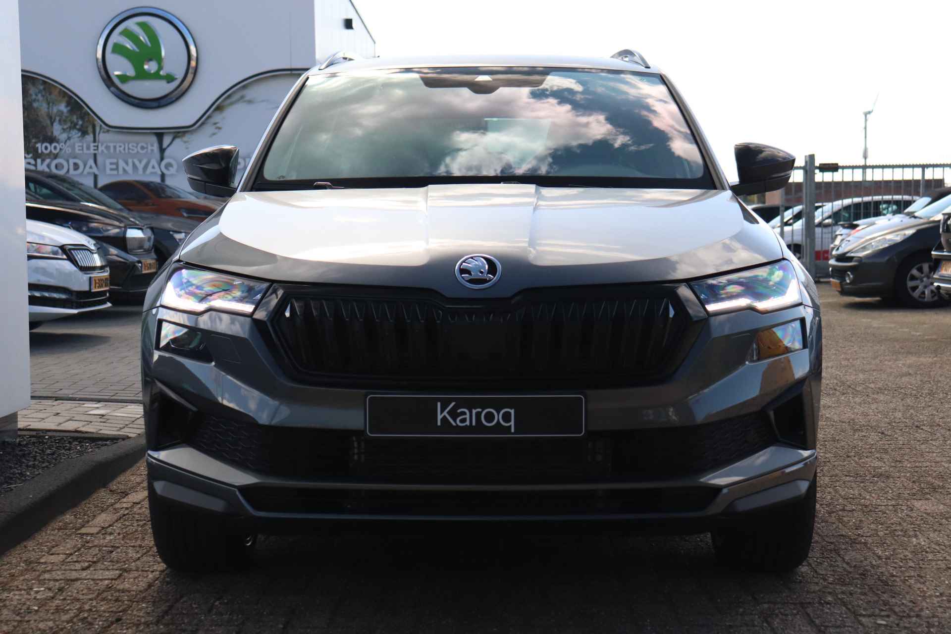 Škoda Karoq 1.5 TSI ACT 150pk Sportline Business | Adaptieve cruise control | Verwarmde voorruit | Panorama dak | 19" velgen | - 3/36