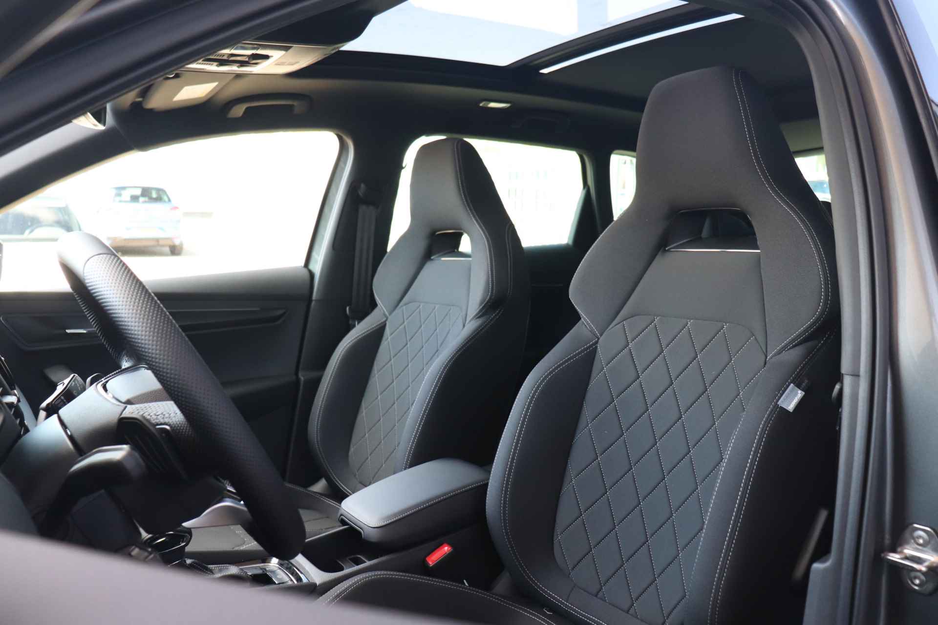 Škoda Karoq 1.5 TSI ACT 150pk Sportline Business | Adaptieve cruise control | Verwarmde voorruit | Panorama dak | 19" velgen | - 13/36
