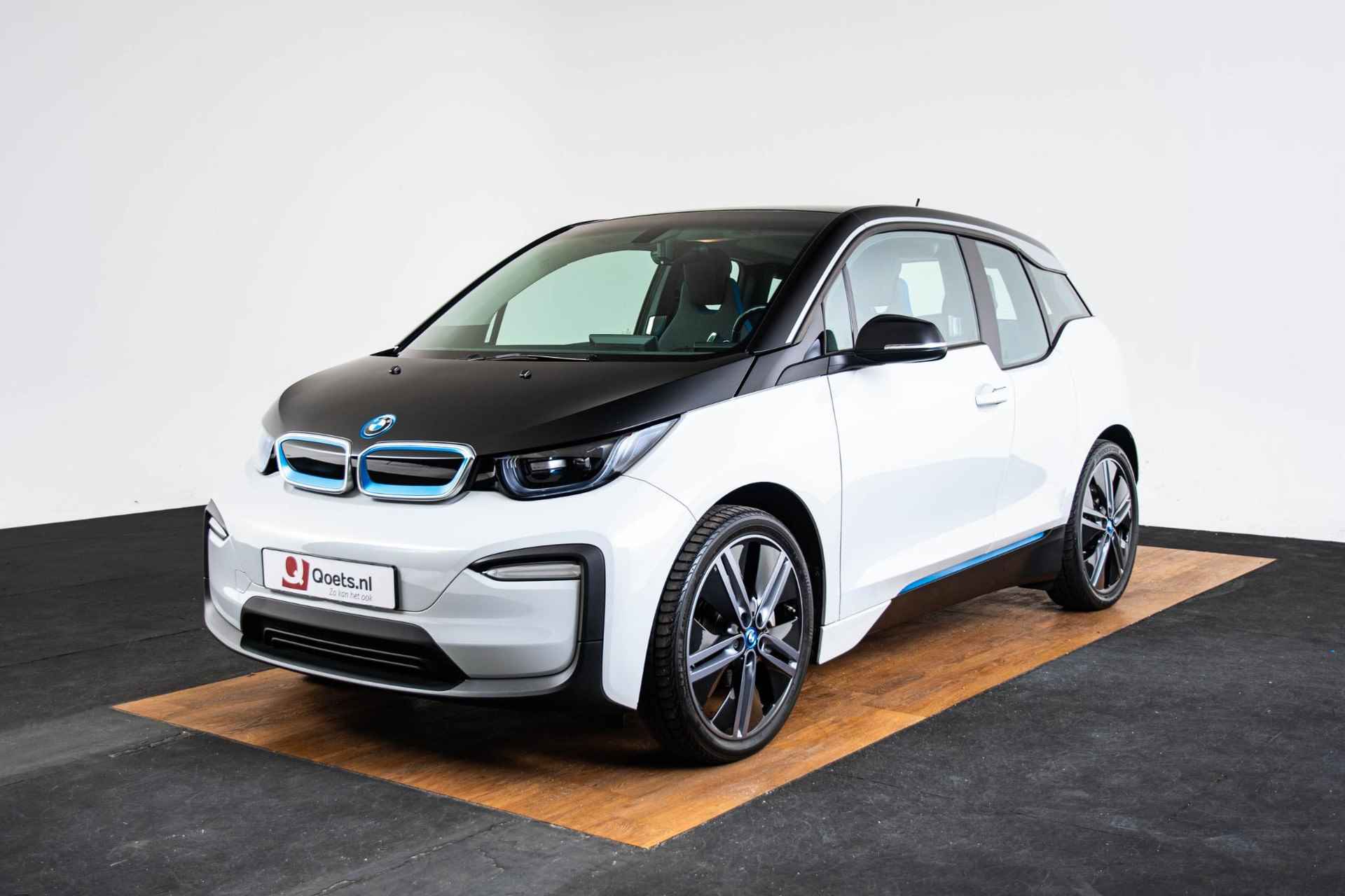 BMW i3 Basis 120Ah 42 kWh Navigatiesysteem Professional - Stoelverwarming - Warmtepomp - Snellaadpakket - DAB-tuner - WiFi hotspot - 20 inch - 44/58