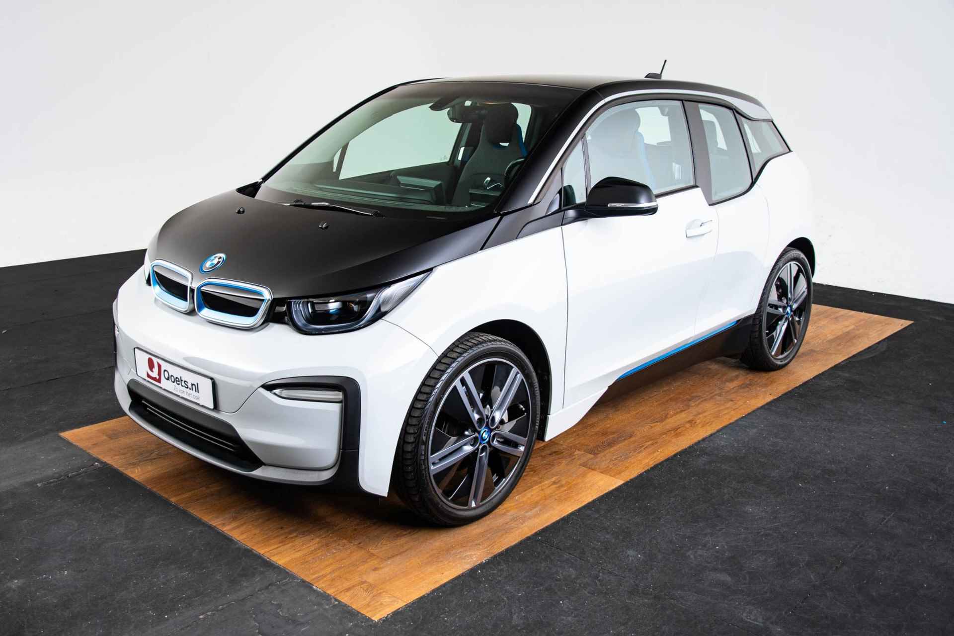 BMW i3 Basis 120Ah 42 kWh Navigatiesysteem Professional - Stoelverwarming - Warmtepomp - Snellaadpakket - DAB-tuner - WiFi hotspot - 20 inch - 54/58