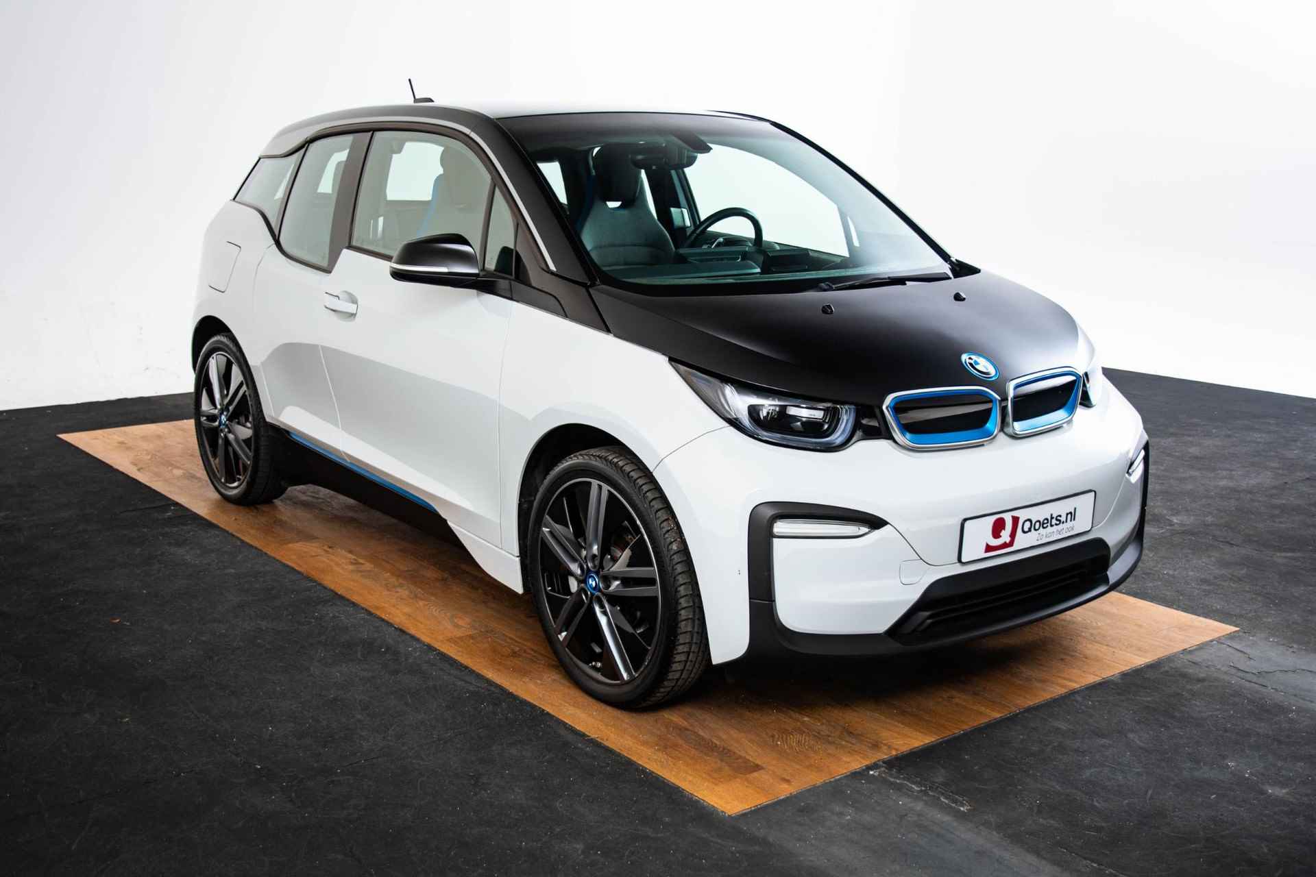 BMW i3 Basis 120Ah 42 kWh Navigatiesysteem Professional - Stoelverwarming - Warmtepomp - Snellaadpakket - DAB-tuner - WiFi hotspot - 20 inch - 56/58