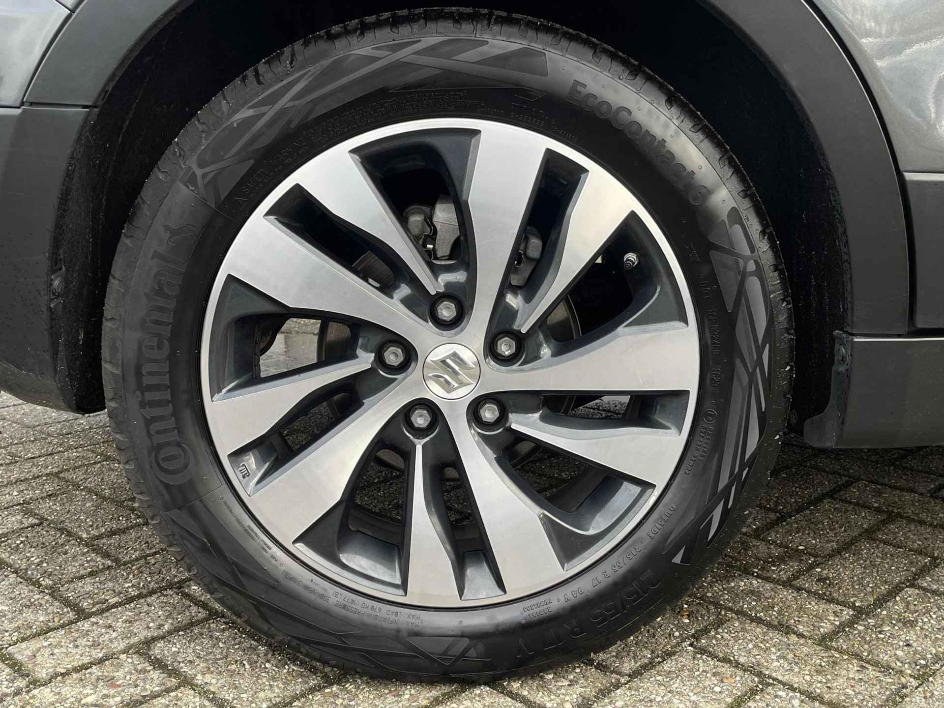 Suzuki Sx4 S-Cross 1.4 Boosterjet AllGrip Stijl Automaat | Lederen bekleding | Navigatiesysteem | All Gripp | Climate Control | Elektrisch schuif- kanteldak | Pakeersensoren voor- en achter | 36 maanden garantie - 42/43