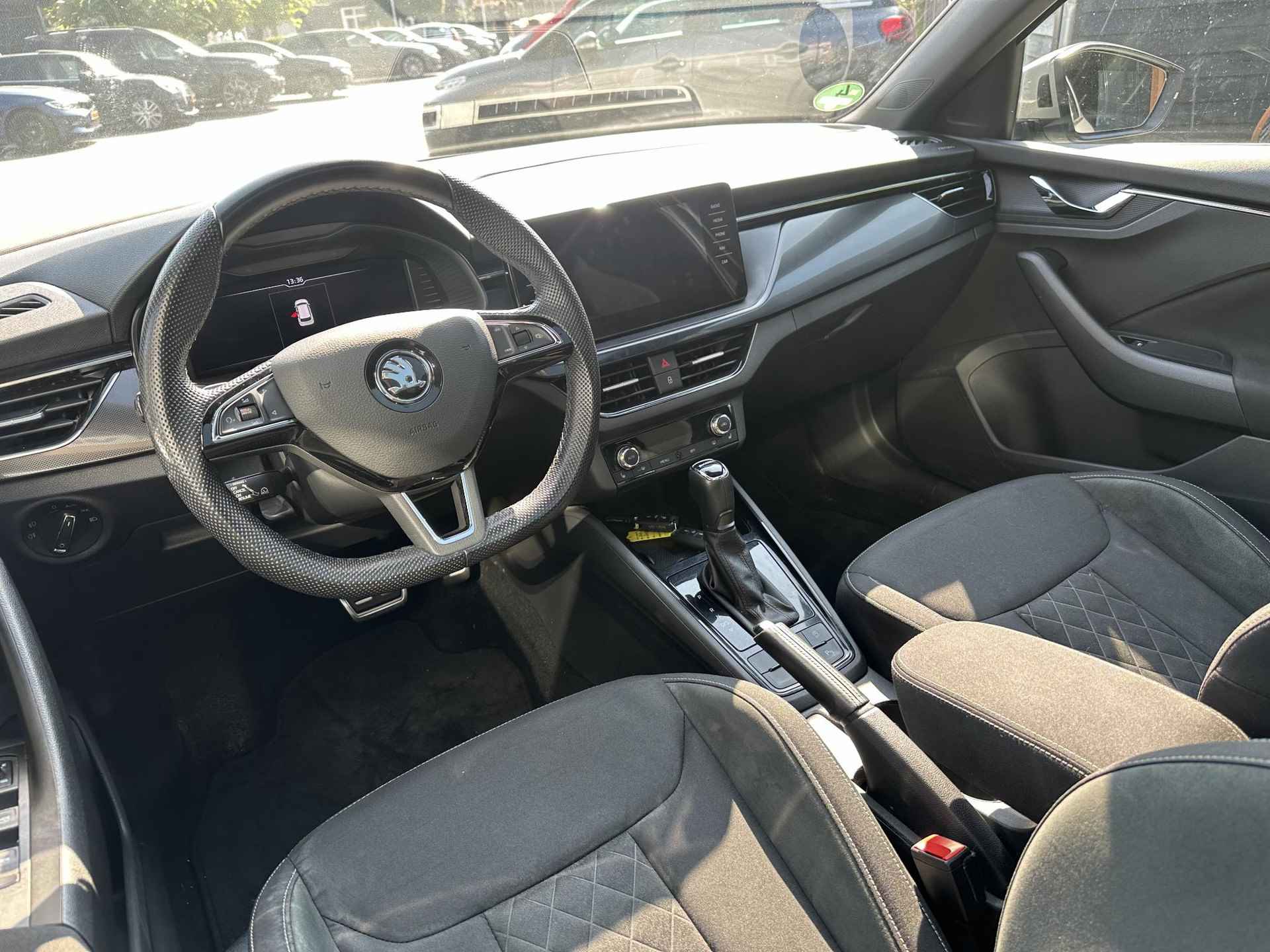 Skoda Kamiq 1.0 TSI Sport Business | Virtual cockpit | Full-map Navigatie | Panoramadak | Trekhaak / Apple Carplay - 2/9