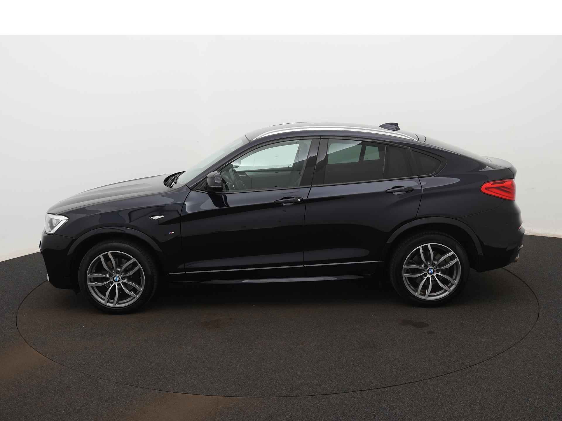 BMW X4 xDrive20i Executive | M-PAKKET | NAVIGATIE | ACHTERUITRIJCAMERA | SPORTSTOELEN | TREKHAAK | ELEKTRISCHE ACHTERKLEP | CLIMATE CONTROL | CRUISE CONTROL | BI-XENON KOPLAMPEN | - 2/21