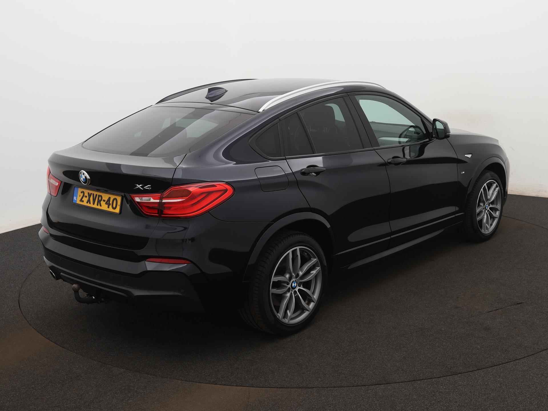 BMW X4 xDrive20i Executive | M-PAKKET | NAVIGATIE | ACHTERUITRIJCAMERA | SPORTSTOELEN | TREKHAAK | ELEKTRISCHE ACHTERKLEP | CLIMATE CONTROL | CRUISE CONTROL | BI-XENON KOPLAMPEN | - 7/21