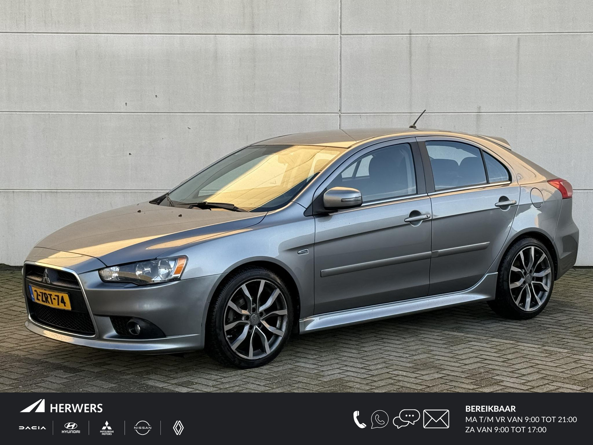 Mitsubishi Lancer Sportback 1.6 Limited Edition / Trekhaak / 18"Lichtmetalen velgen / All Season banden / Parkeersensoren / Stoelverwarming / Climate Control /