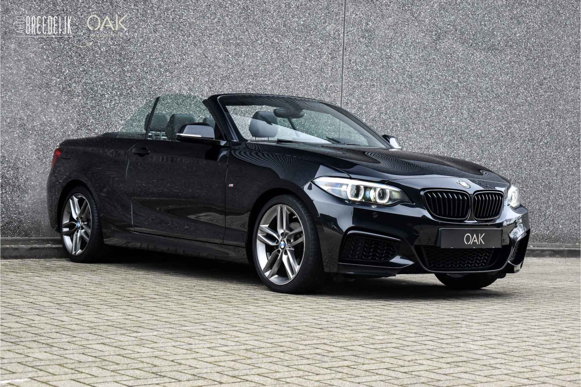 BMW 2 Serie Cabrio 218i Aut. | M-Sport | NaviProf | Leder | Xenon | 18"LM | NL Auto | Sapphire Zwart - 6/23